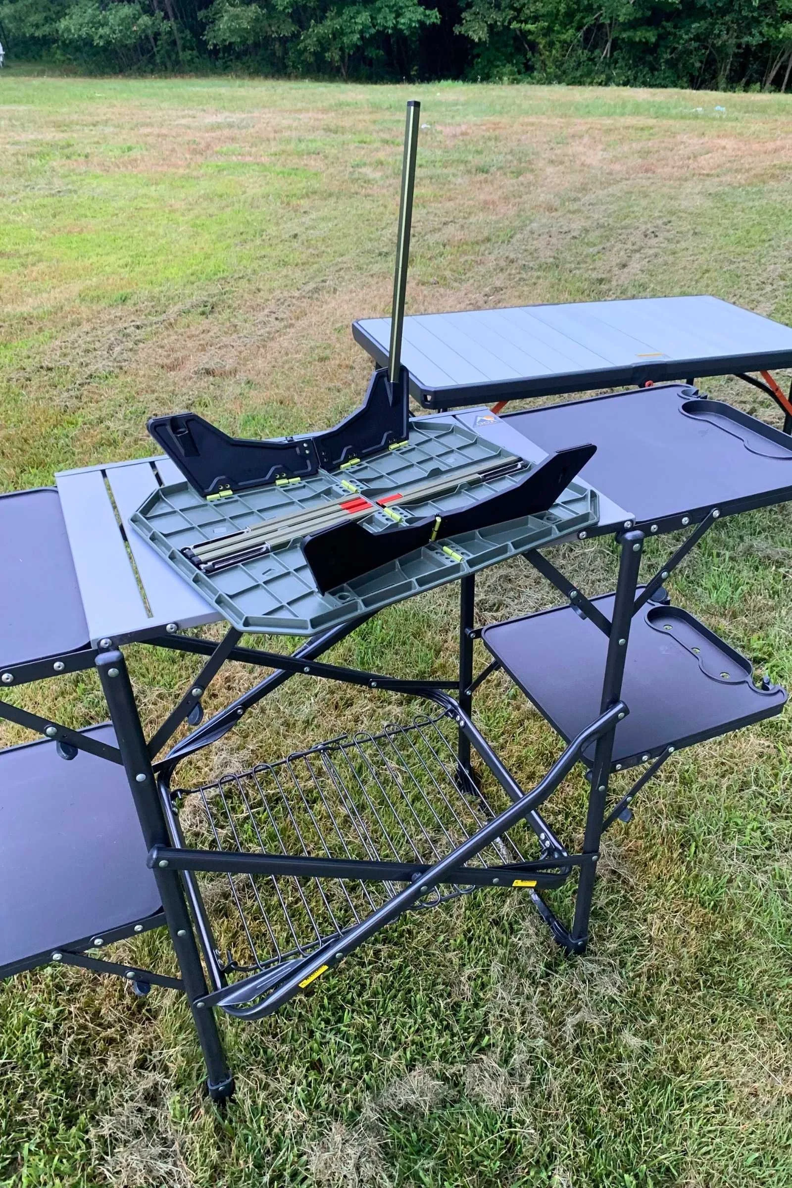 The Nemo Lander side table (above and upside down) has adjustable dual length legs so you can set it up to be a low table or a higher table. It’s on top of the GCI Outdoor Slim Cook station, which only has one height.