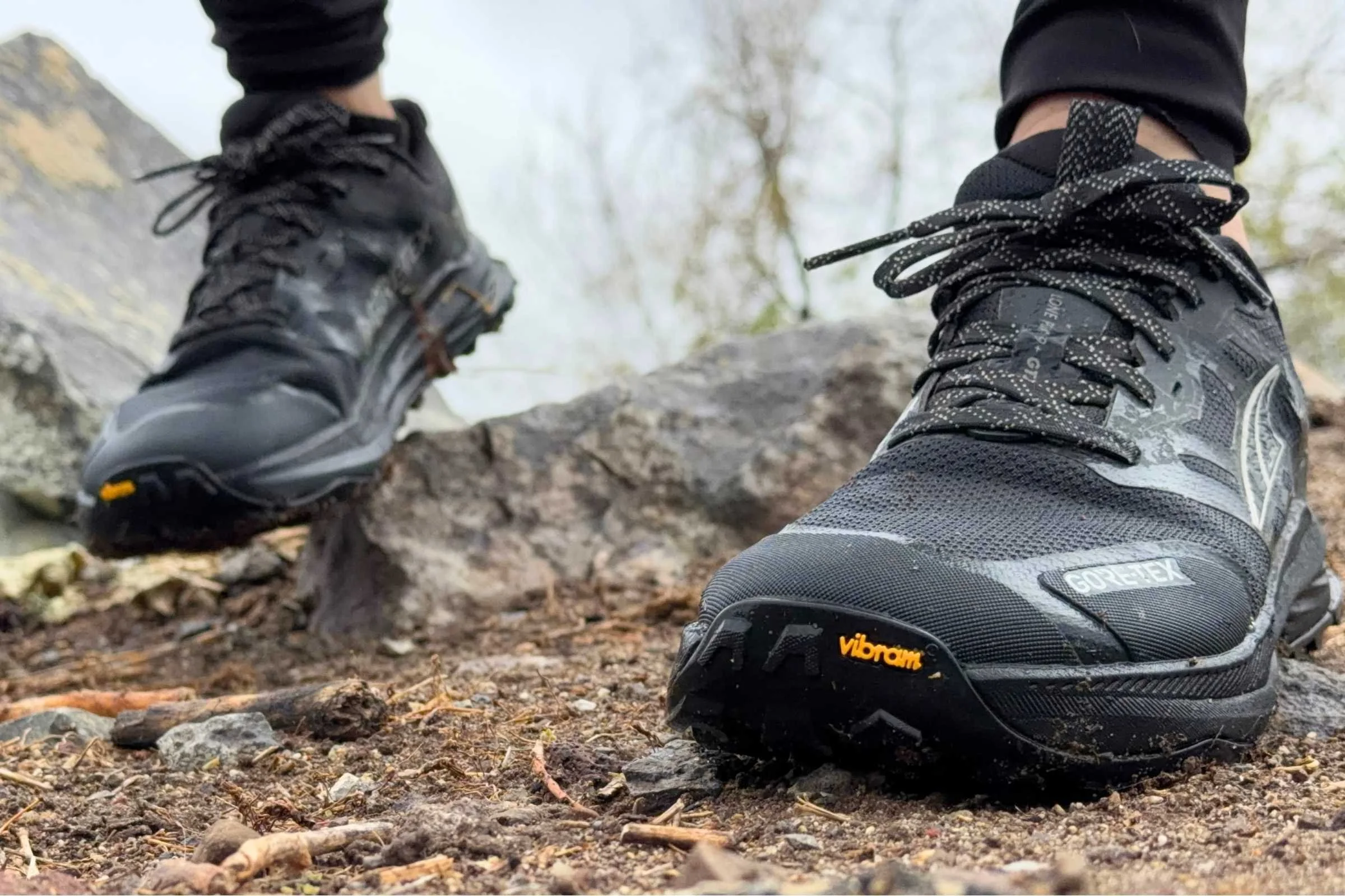 Altra Lone Peak 9+ GTX hiking on a dirk and rock path