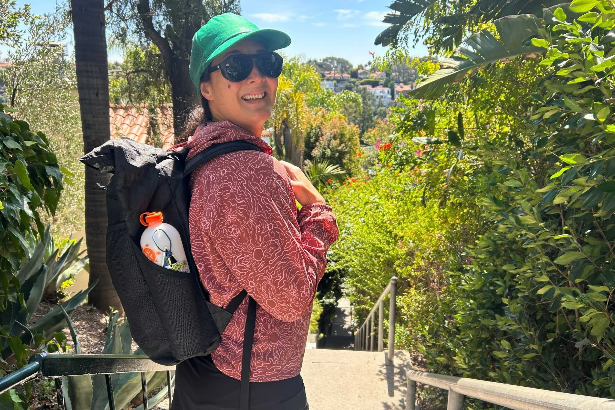 author wearing the ula ultra node 20l backpack on a sunny hike