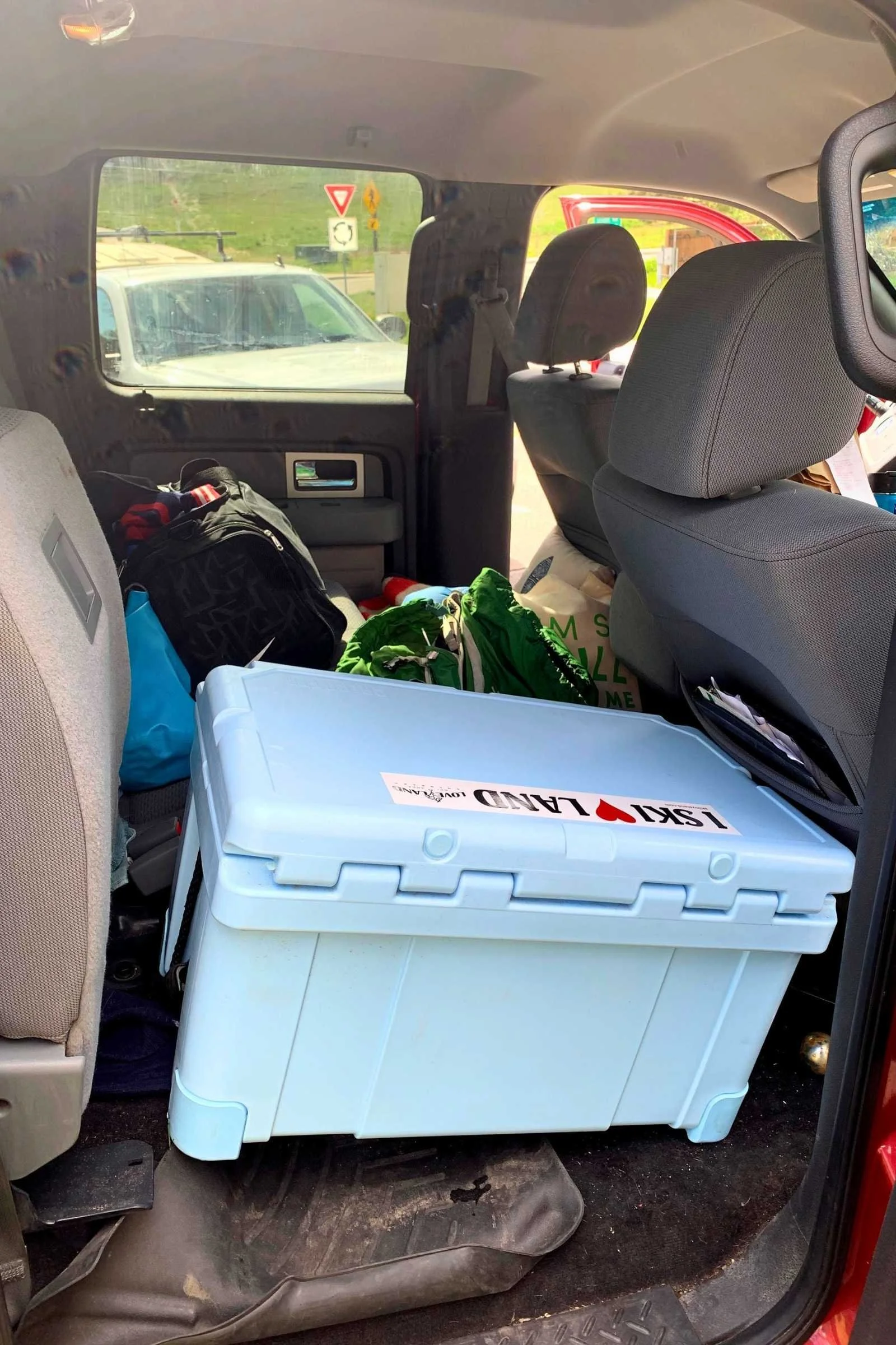 Coolers crammed into the back of a truck still need to keep their items cold. Photo courtesy Josette Deschambeault.