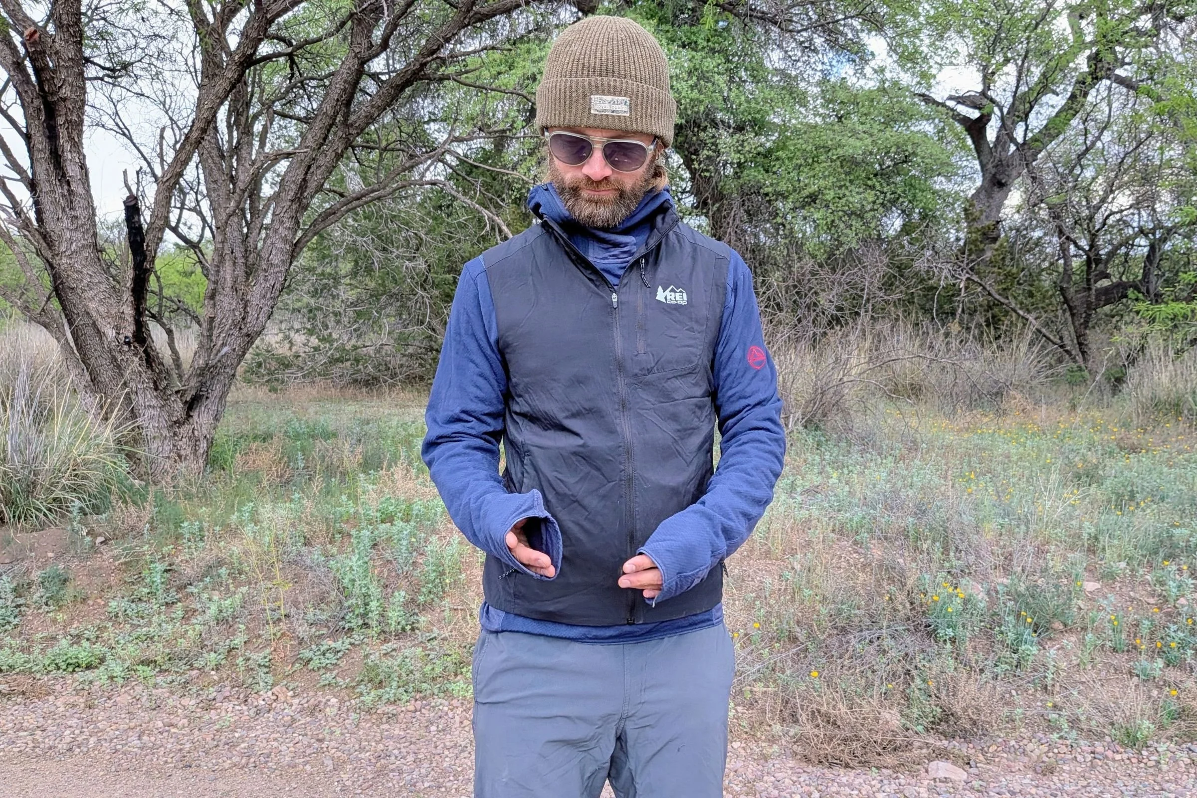 Swiftland insulated vest on a male hiker.