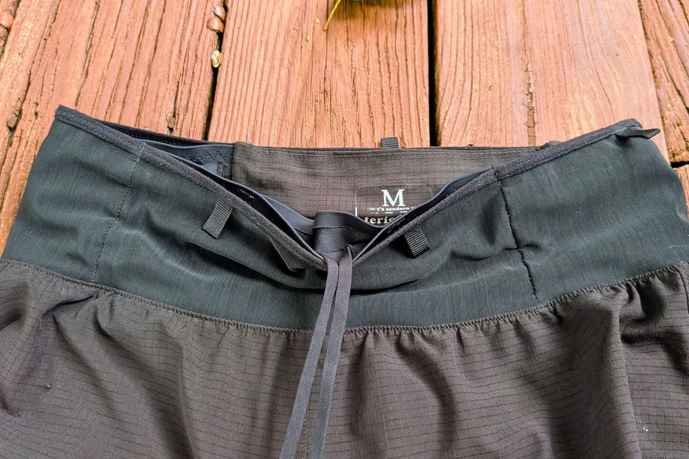 Close-up of Terignota Sendero Shorts highlighting the side zipper pocket.