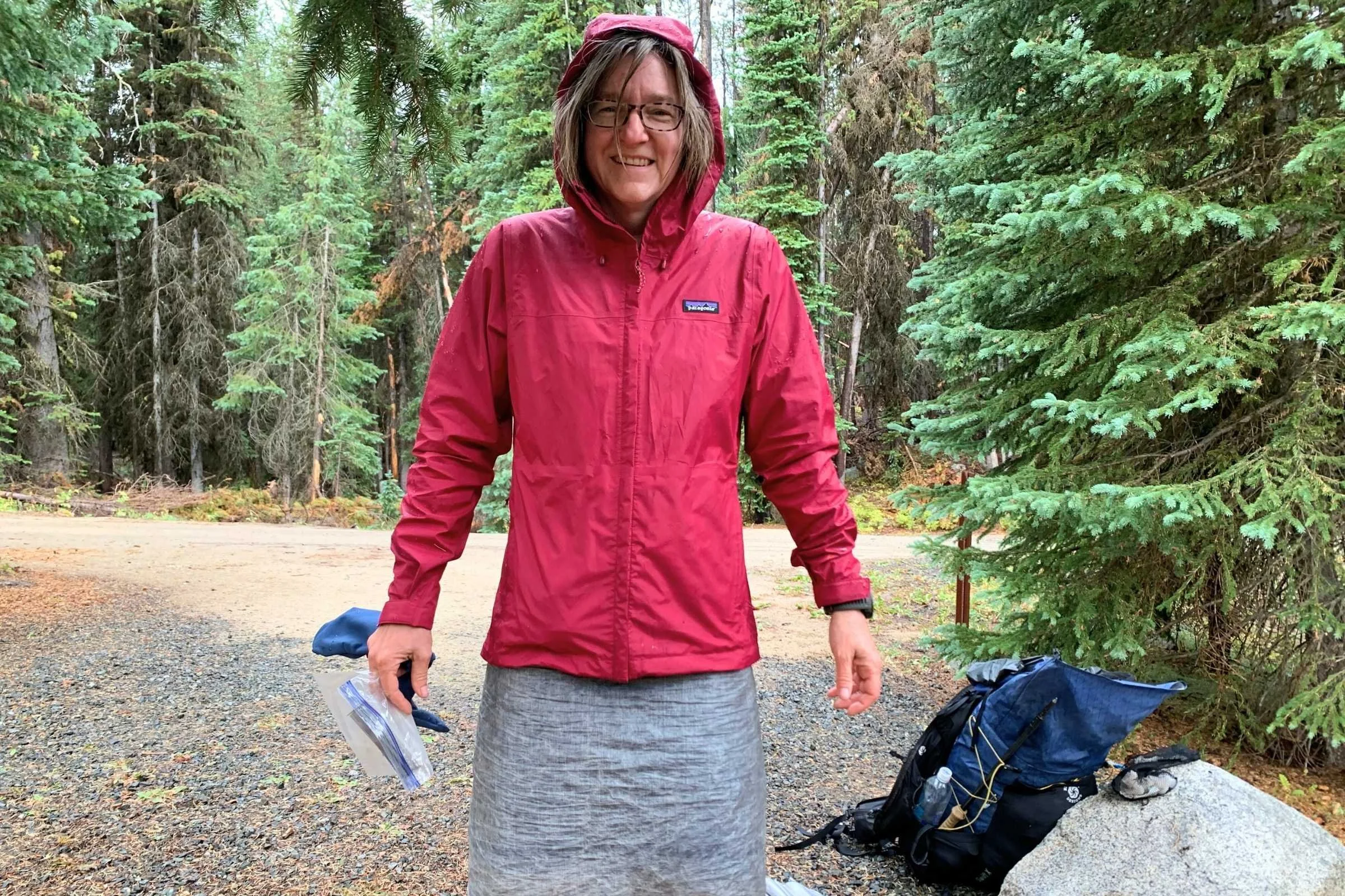 Patagonia Torrentshell 3L Rain Jacket on a hiker in the rain