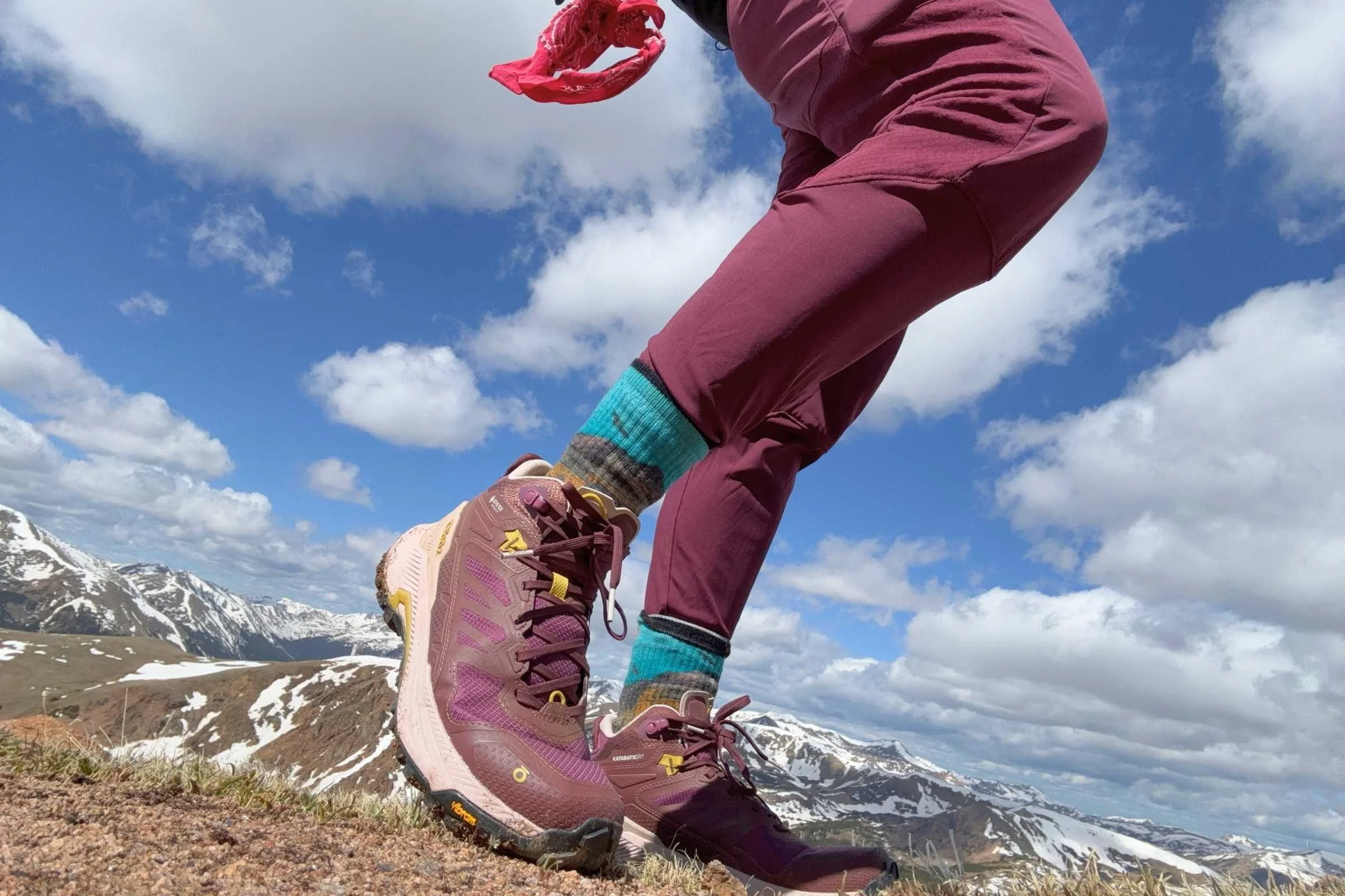 Side Profile of the Oboz Katabatic RT Mid on snowy mountaintop