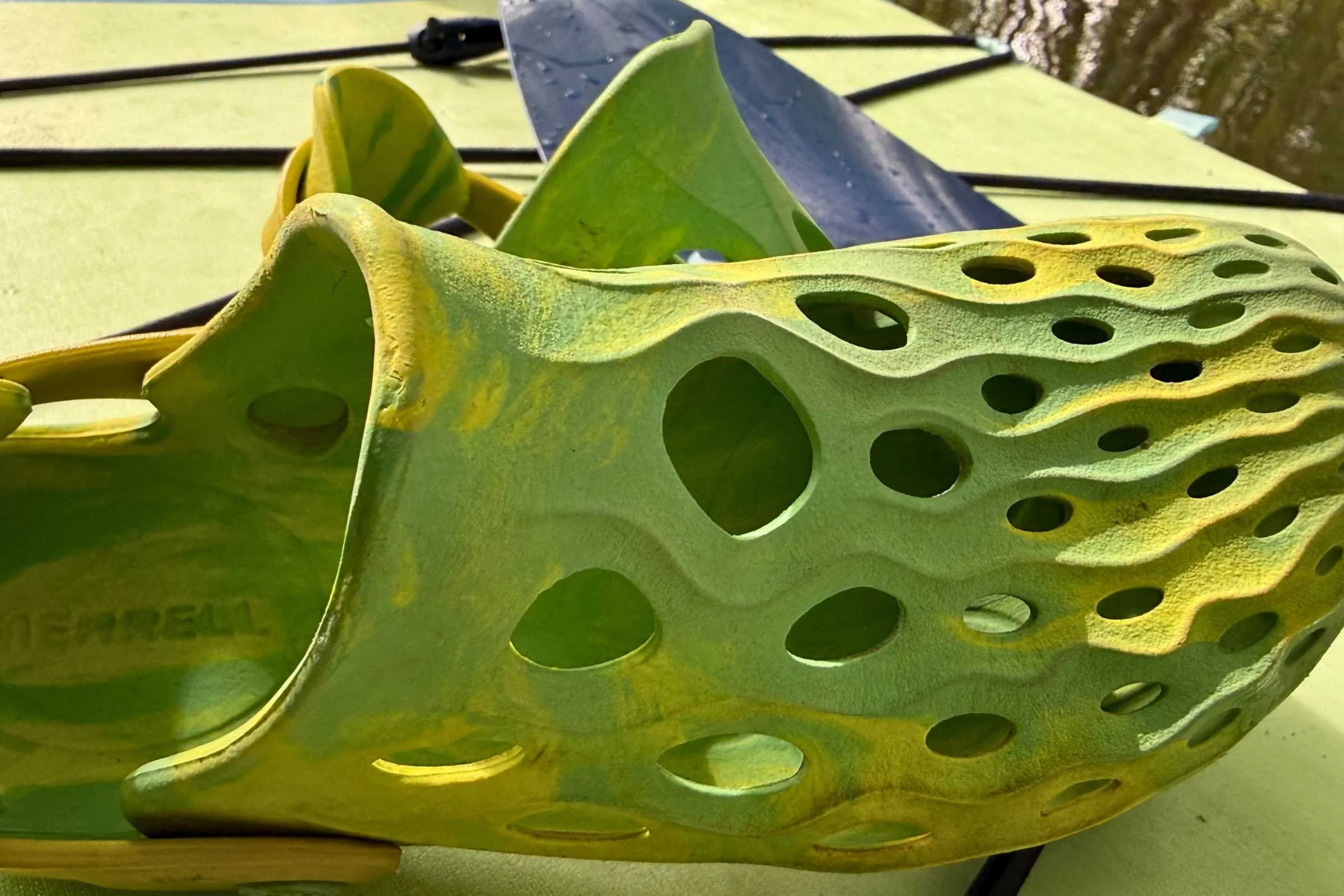 the Merrell Hydro Moc shoes in green/yellow
