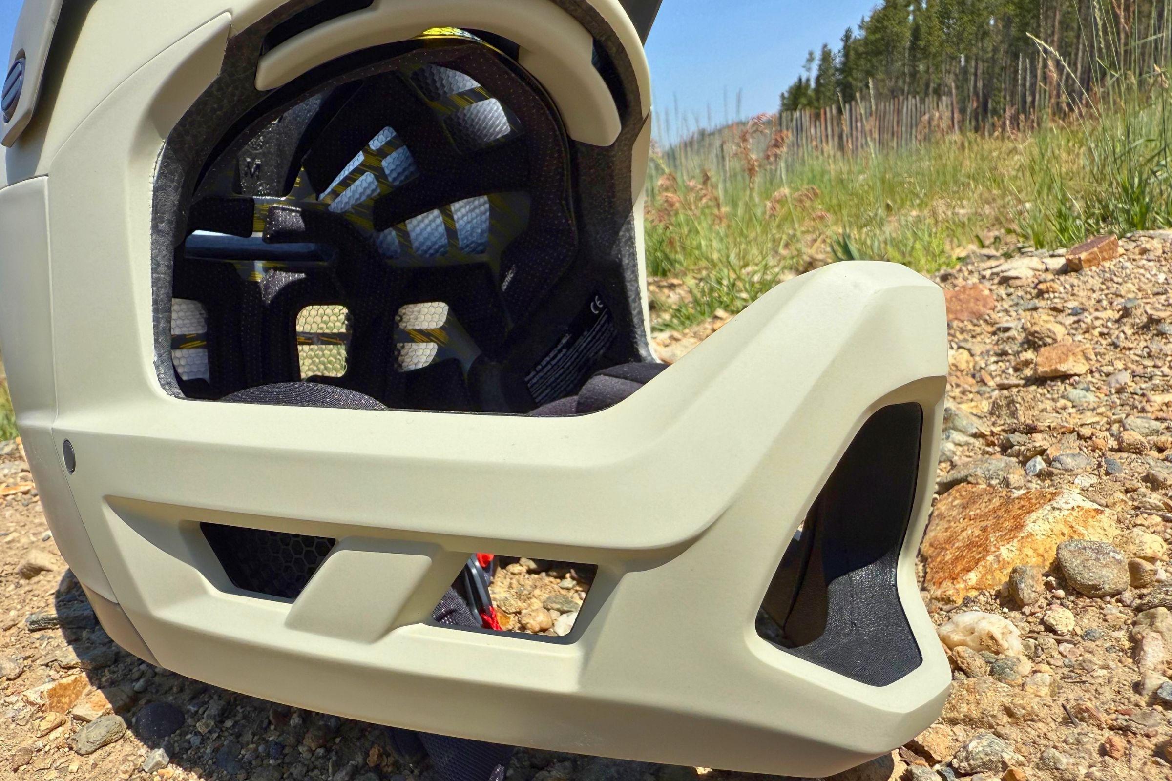 Smith Mainline Mips Helmet rests on dirt.