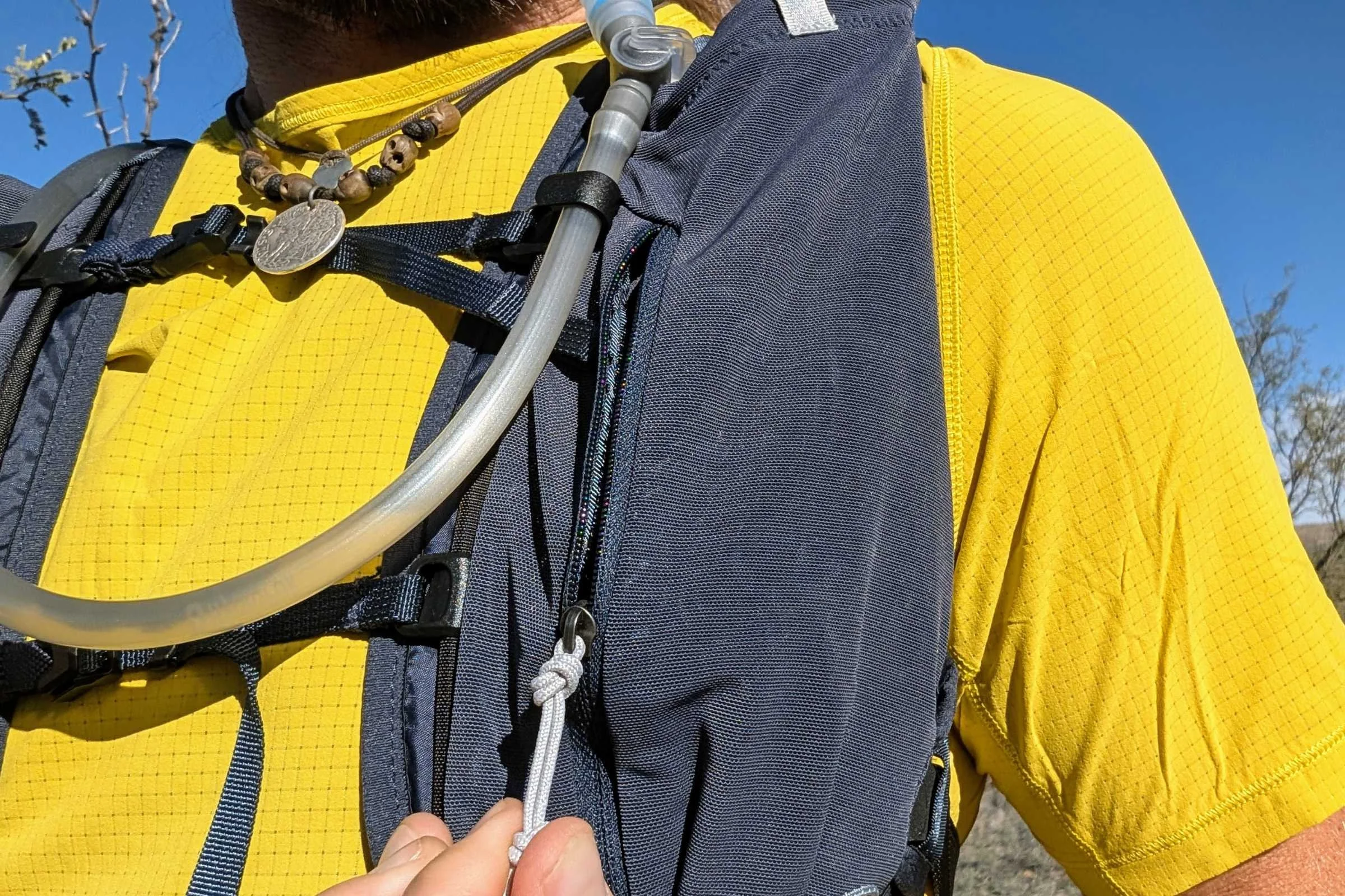 The zippered pocket on top of the soft flask pocket on the shoulder straps is the perfect place for a smartphone.