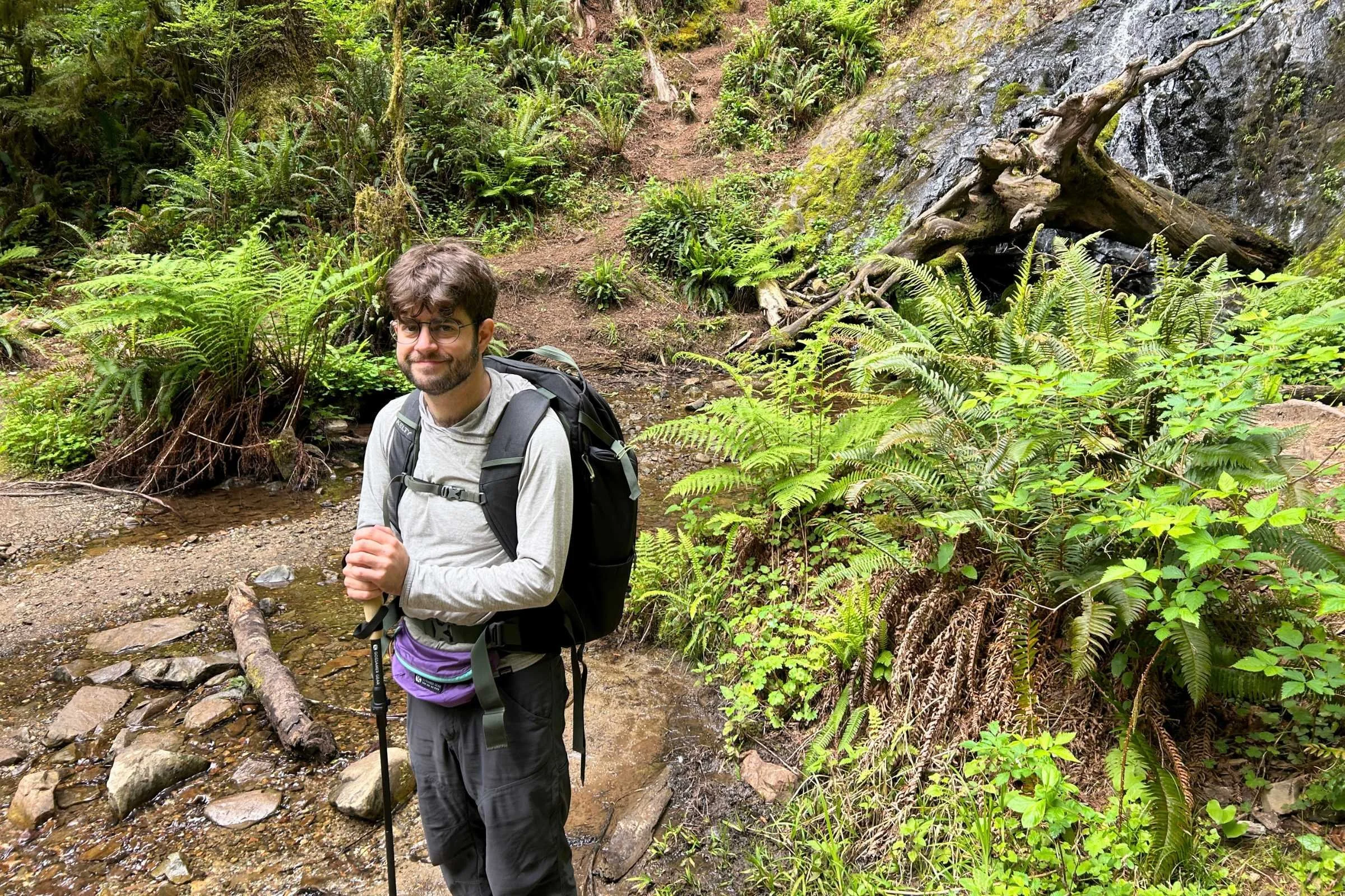 Testing the Gossamer Gear FT3 trekking poles on wet and muddy trail in Redwood National Park.