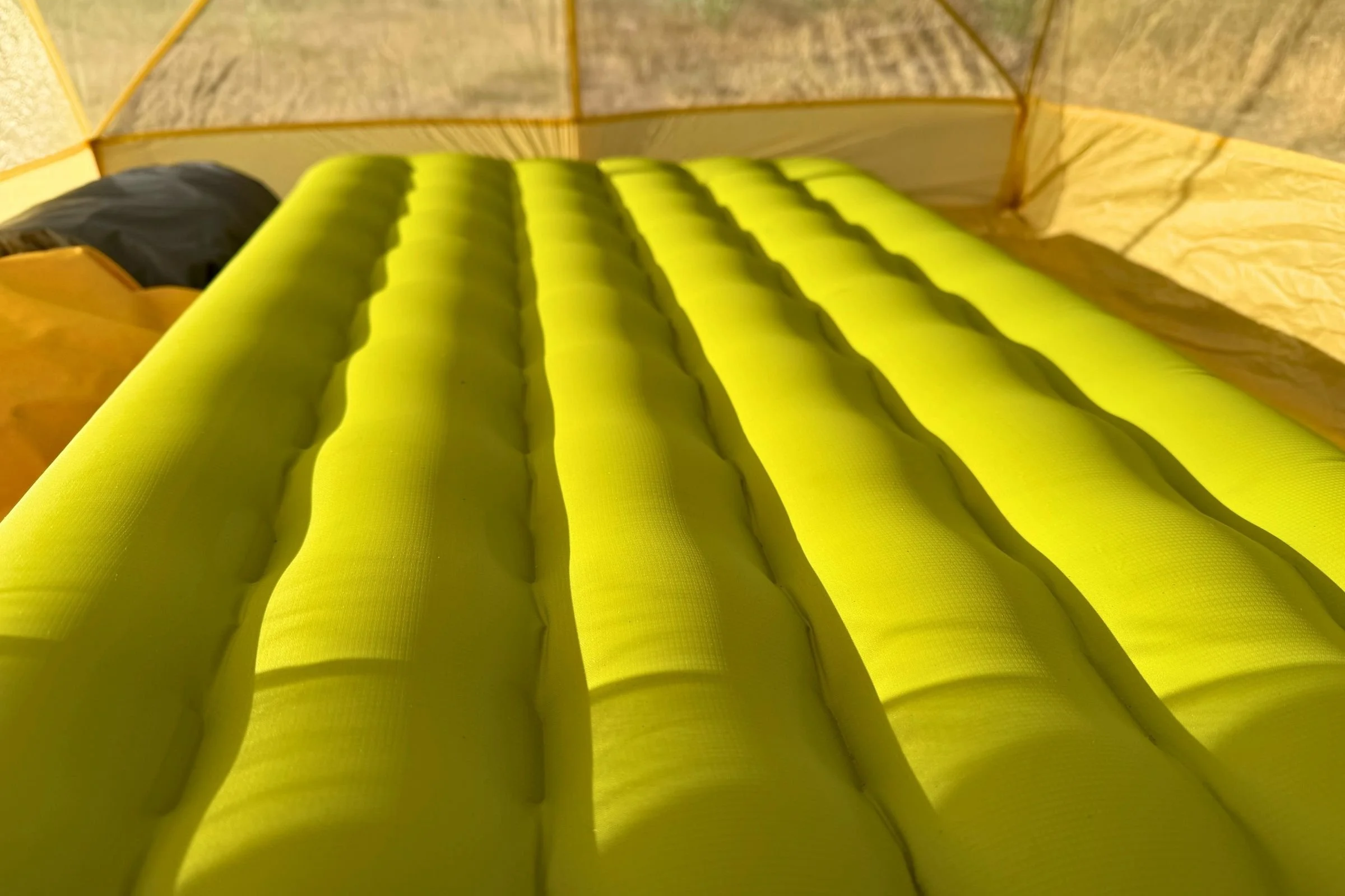 Four inches of thickness and long vertical baffles makes this pad a great design comfort-wise for side-sleepers.