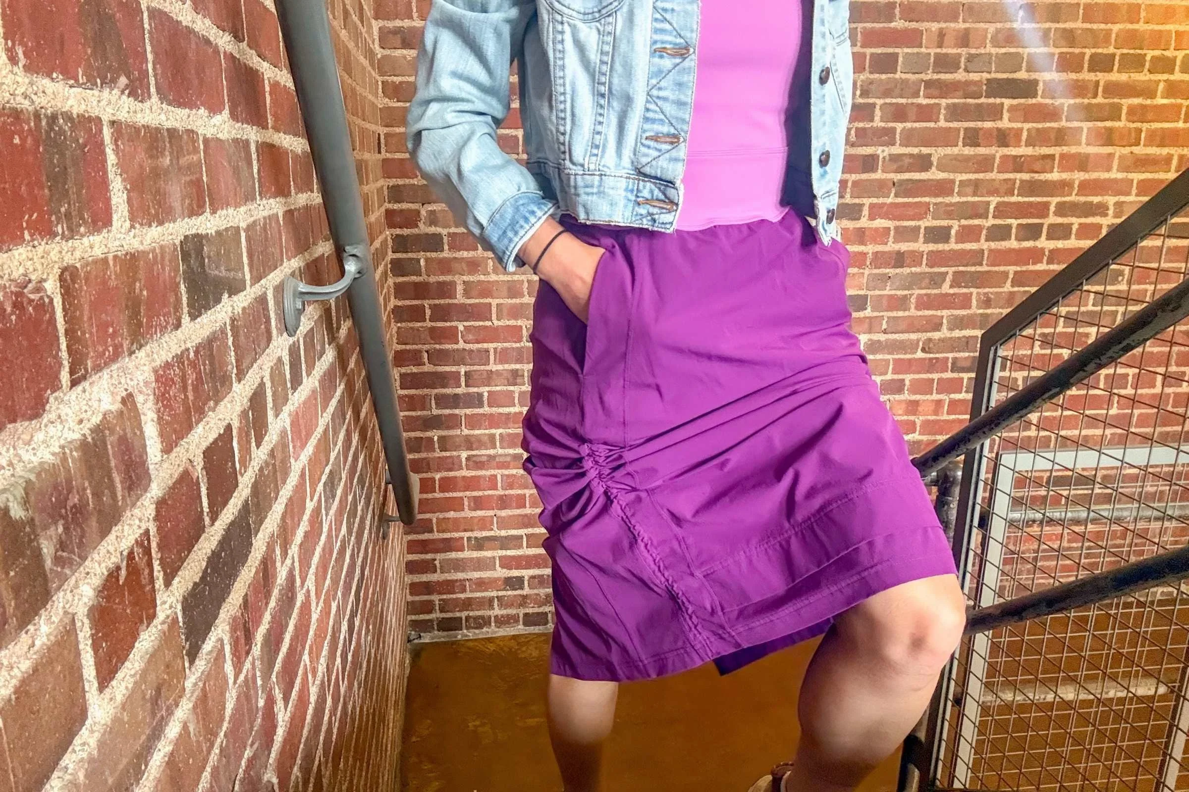 Cinched hem in motion on the Title Nine Limitless Midi Dress