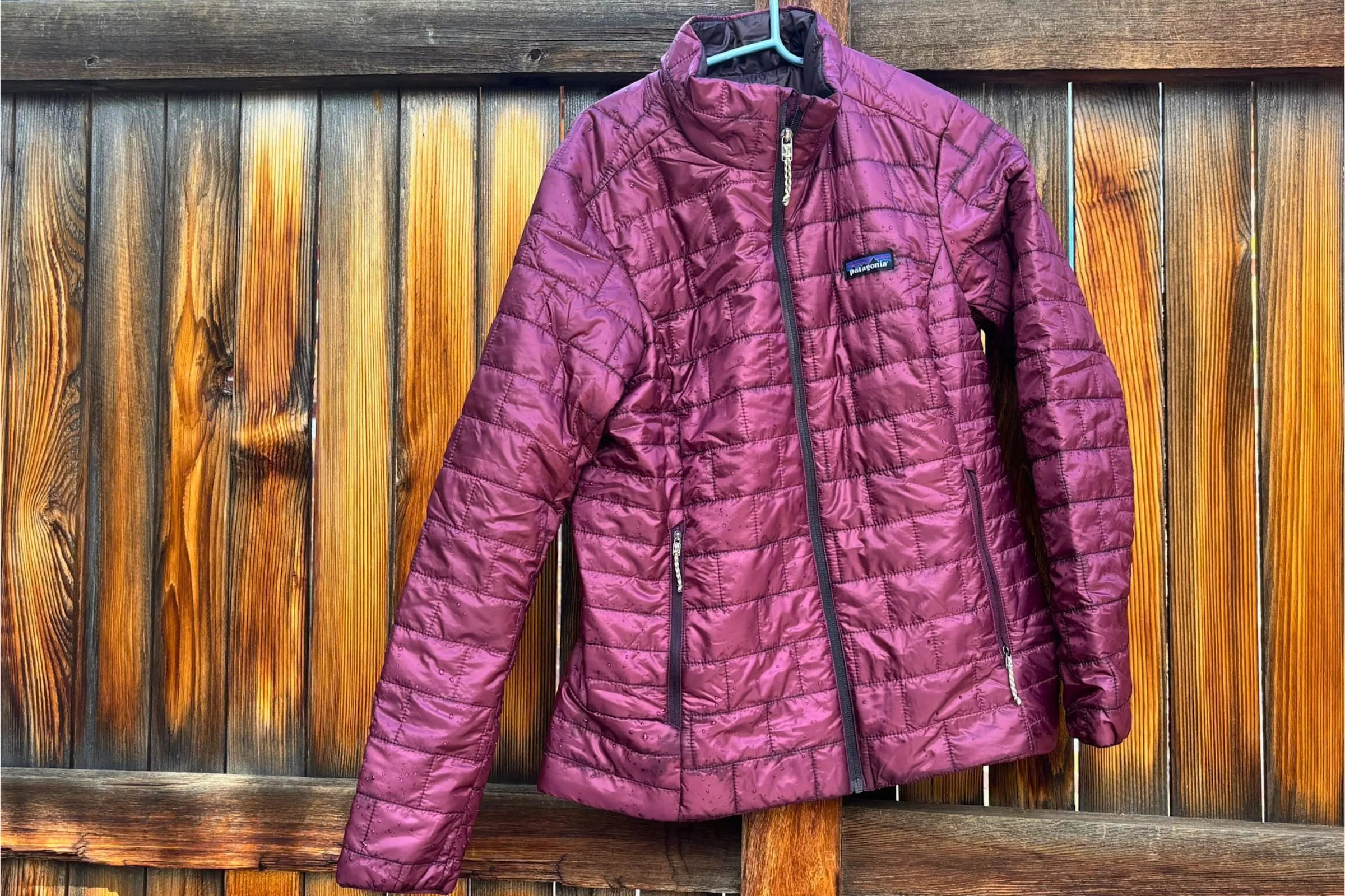 Women's Patagonia Nano Puff jacket on a coat hanger.