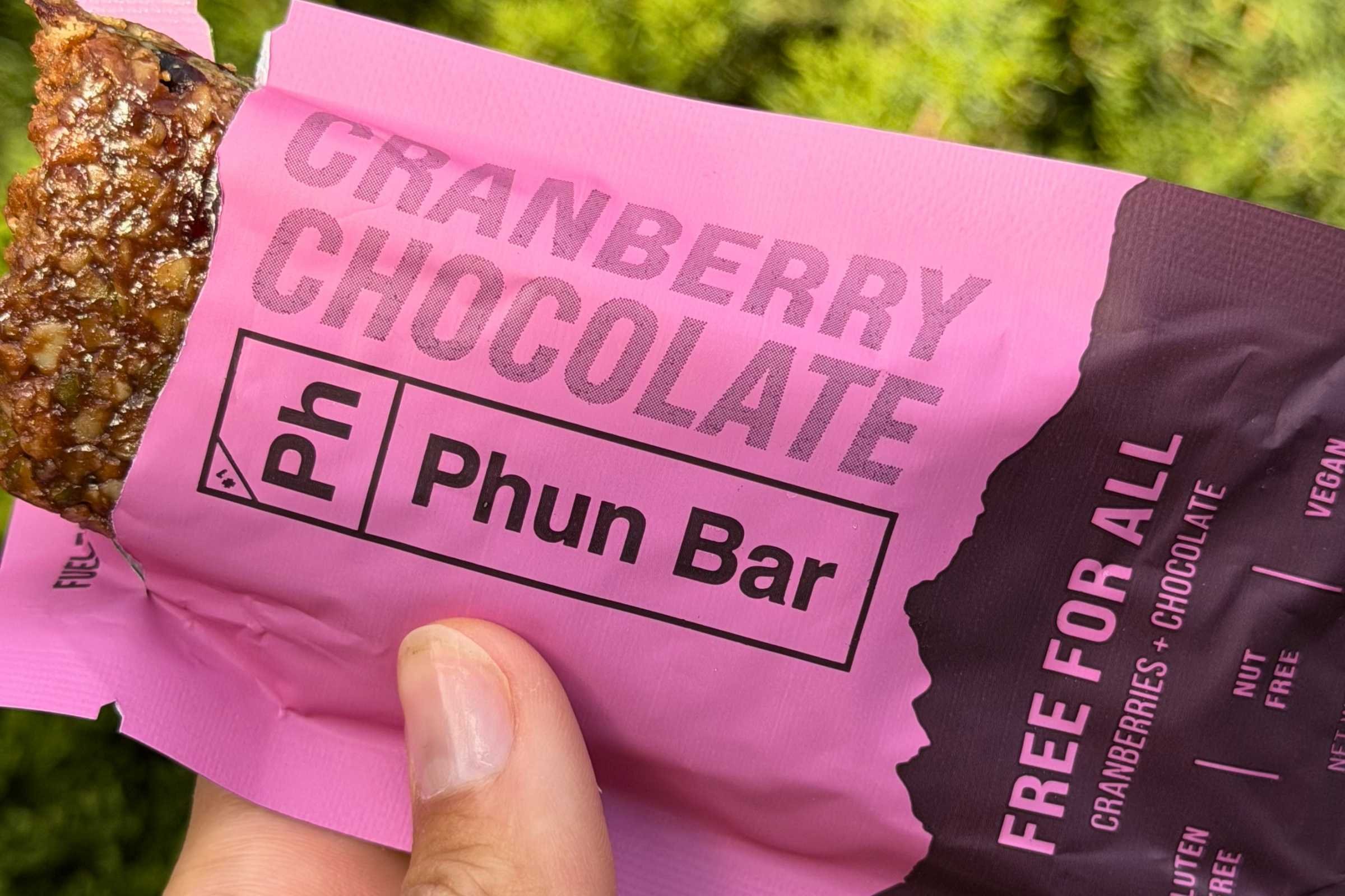 an open pink package Phun Bar