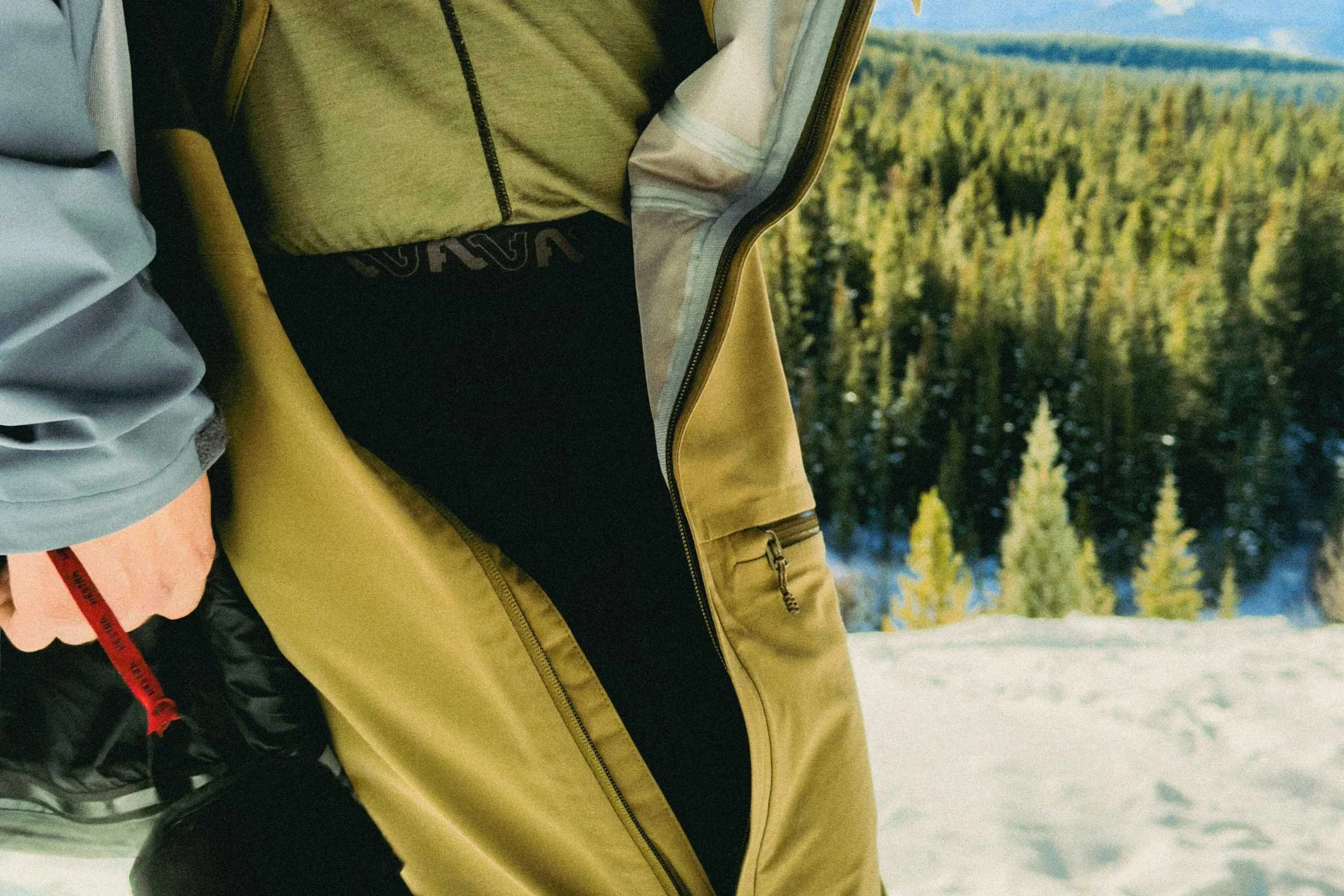 The Cloudchaser bibs have a large side zip that opens to the back for bathroom needs or layering adjustments. Photo credit: Jacob Callaghan