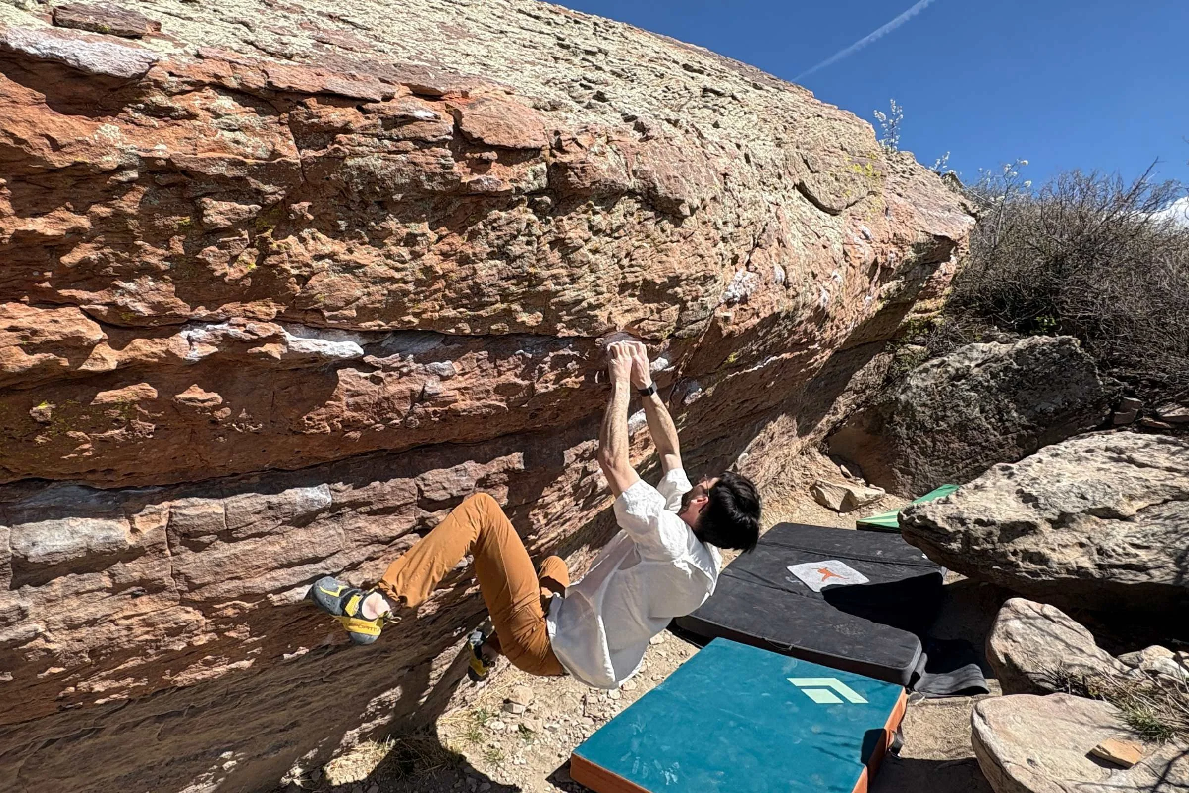 Climber bouldering outdoors