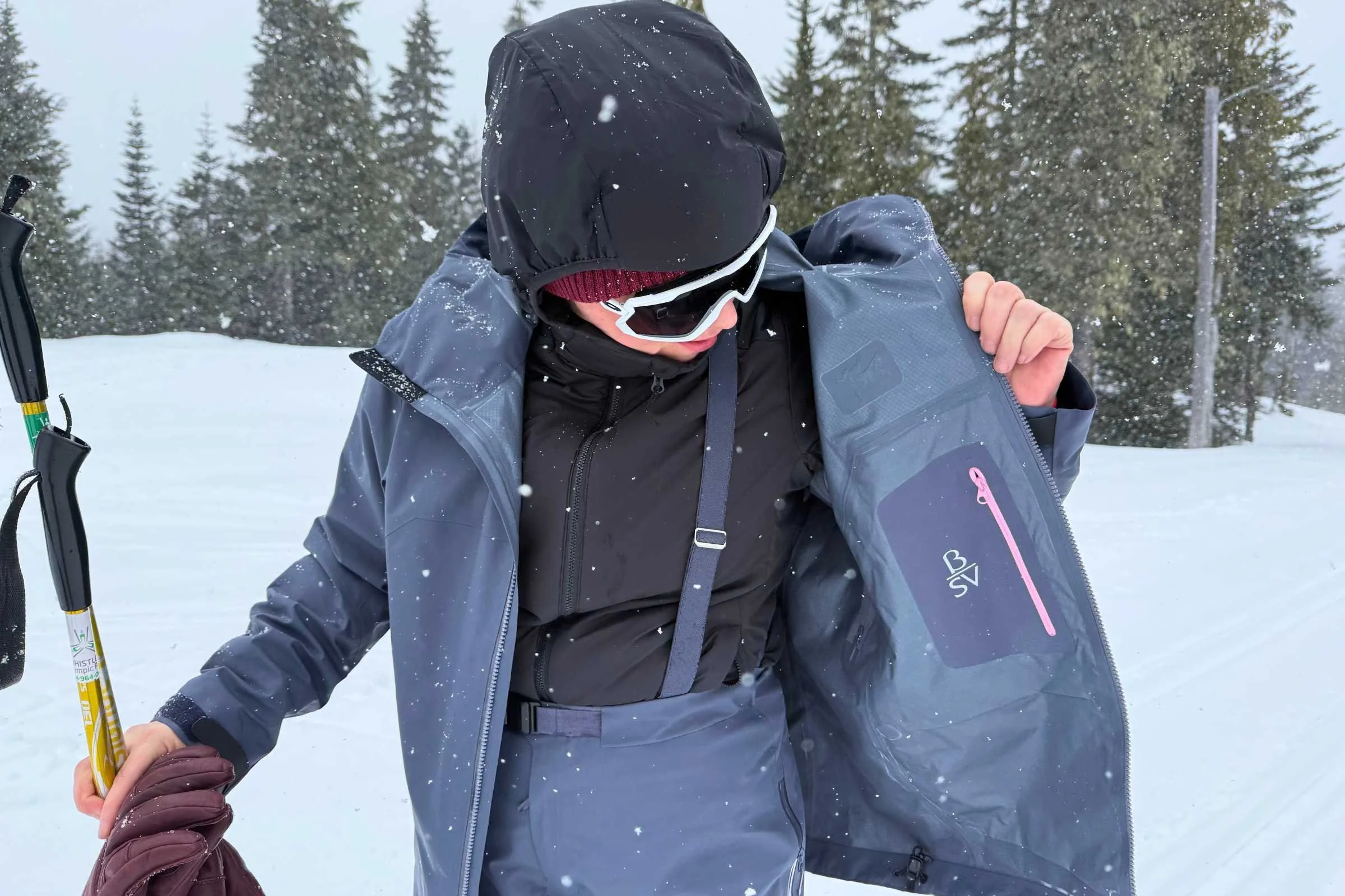 Layering a lightweight hoodie and merino wool base layer under the Beta SV.