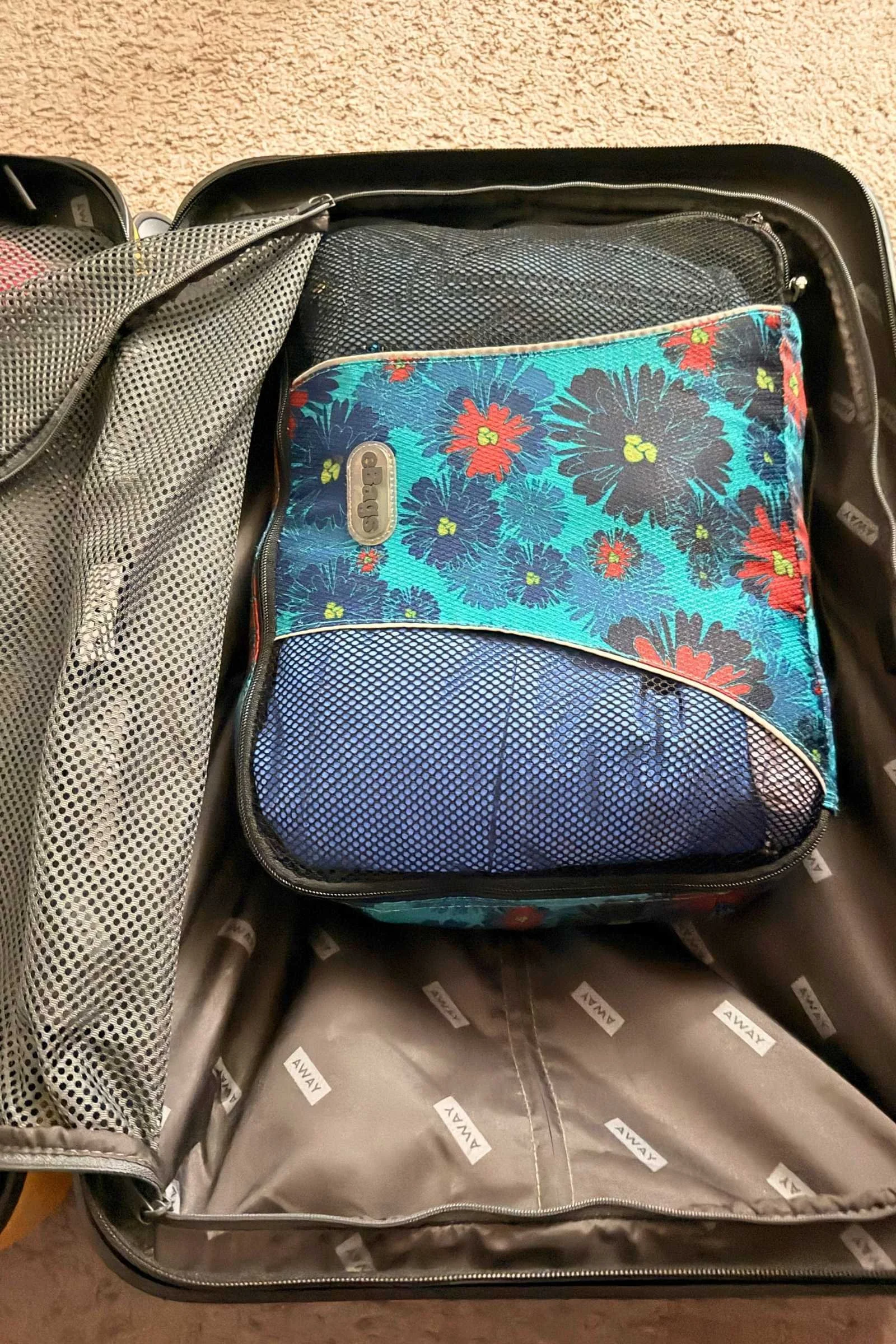 Travel pants packed in a travel compression cube