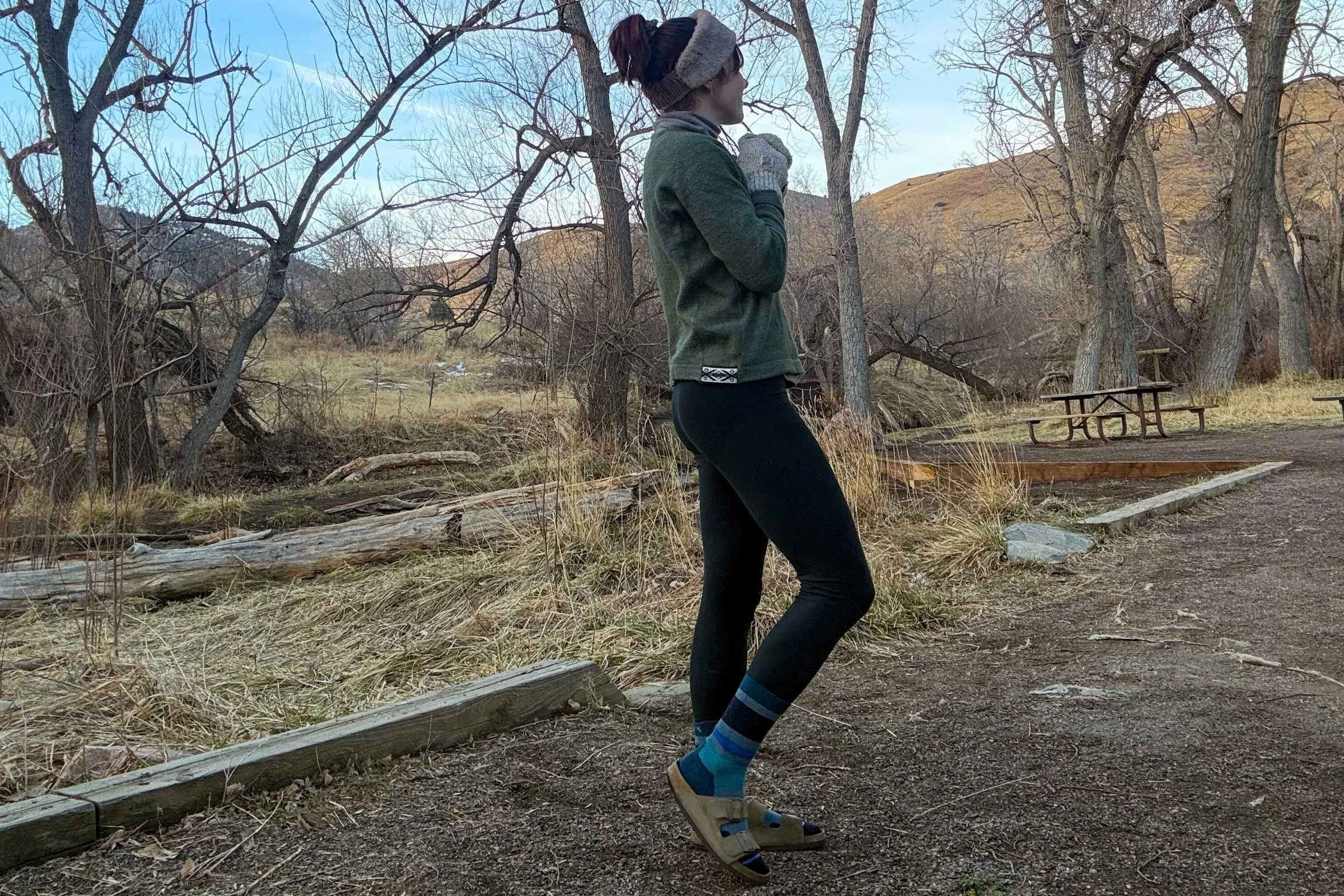 person wearing birkenstock arizona sandals at a picnic site
