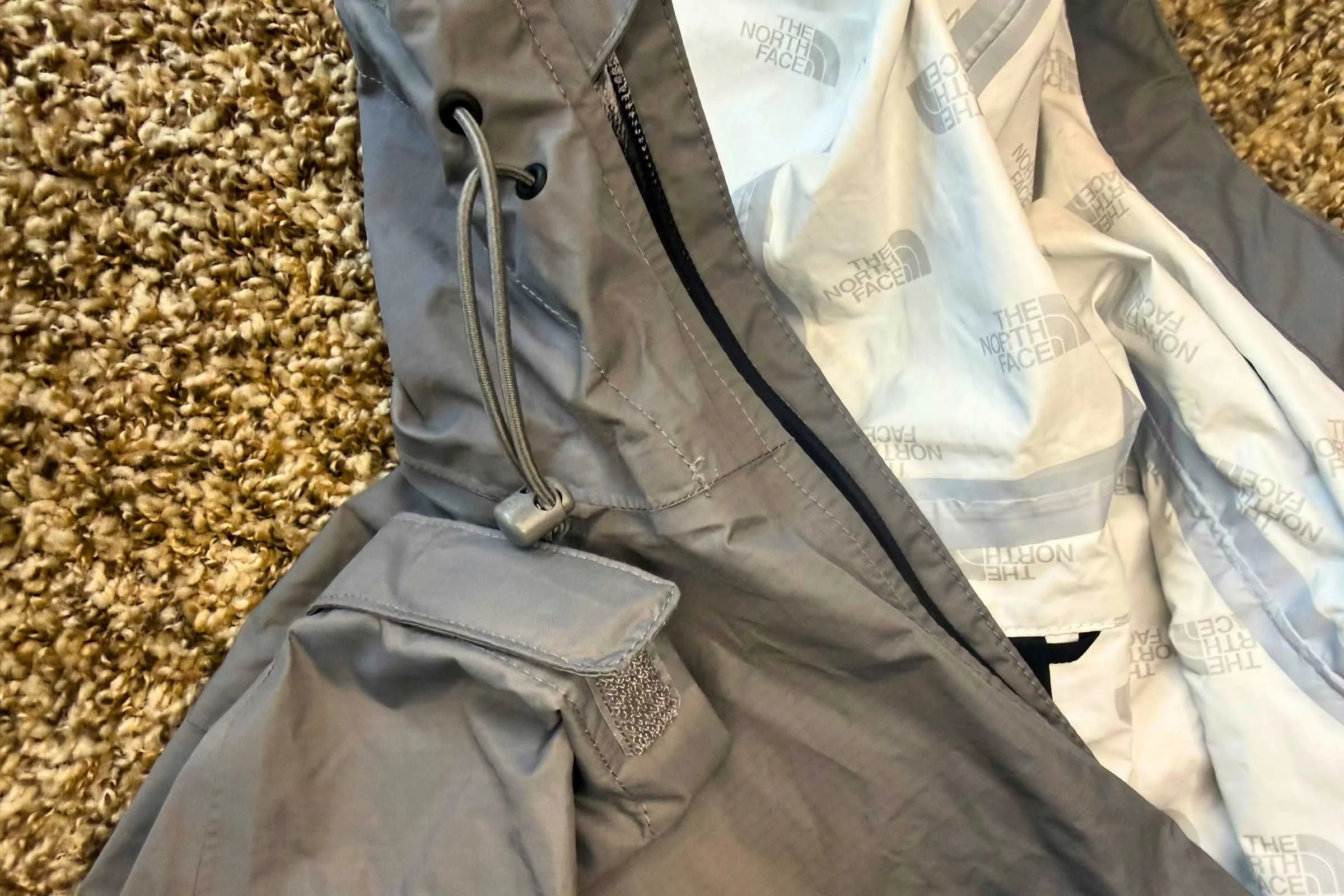 The North Face Alta Vista is adjustable at the hem and hood with cinch cords, and at the cuffs with hook-and-loop adjustments.