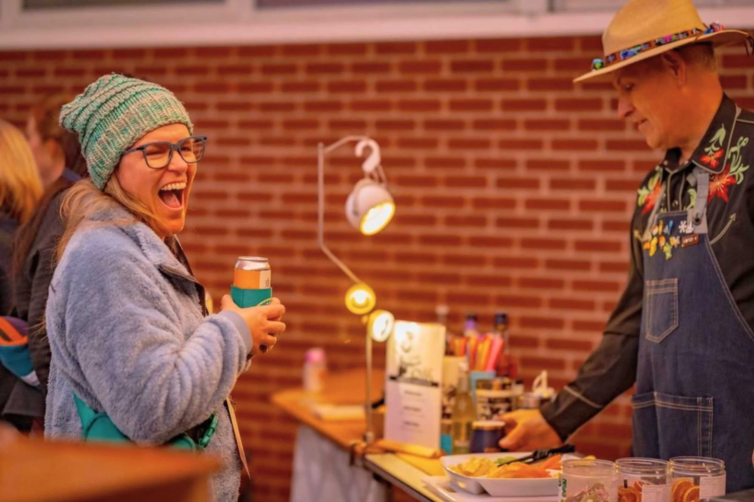 Treeline writer and reviewer Sara enjoying the Outdoor Market Alliance Winter 2026 event