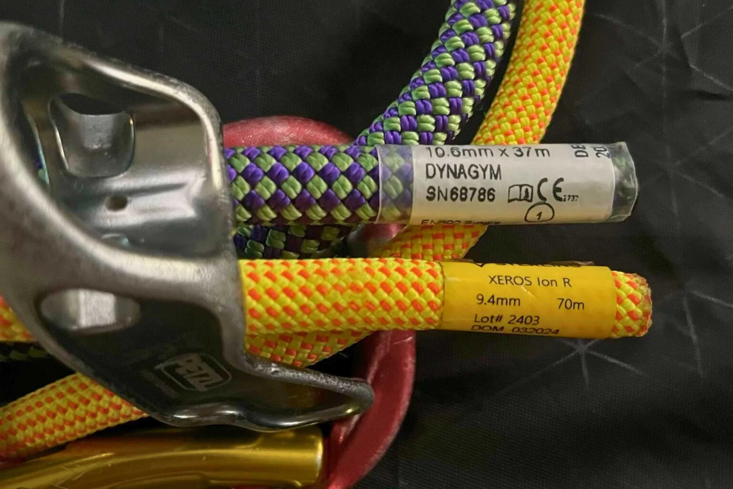 The Petzl Reverso belay device is designed to handle ropes as thin as 6.9mm and up to 10.5mm. However, it fit the 10.6mm DynaGym climbing rope (top), but works more easily with the 9.4 mm Ion R climbing rope (bottom).