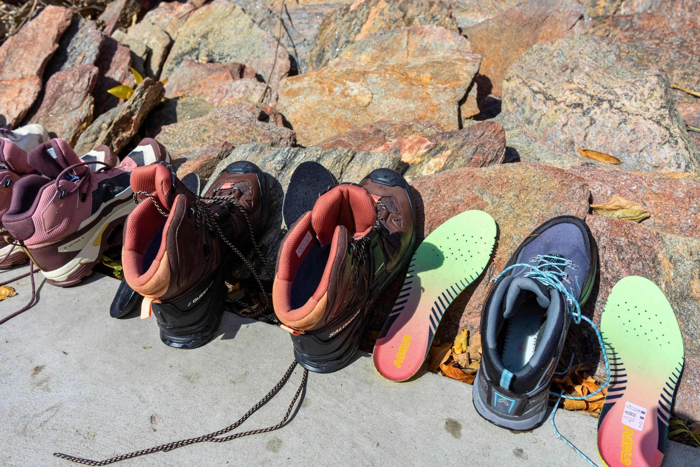 Top down view and insoles of many boots we tested