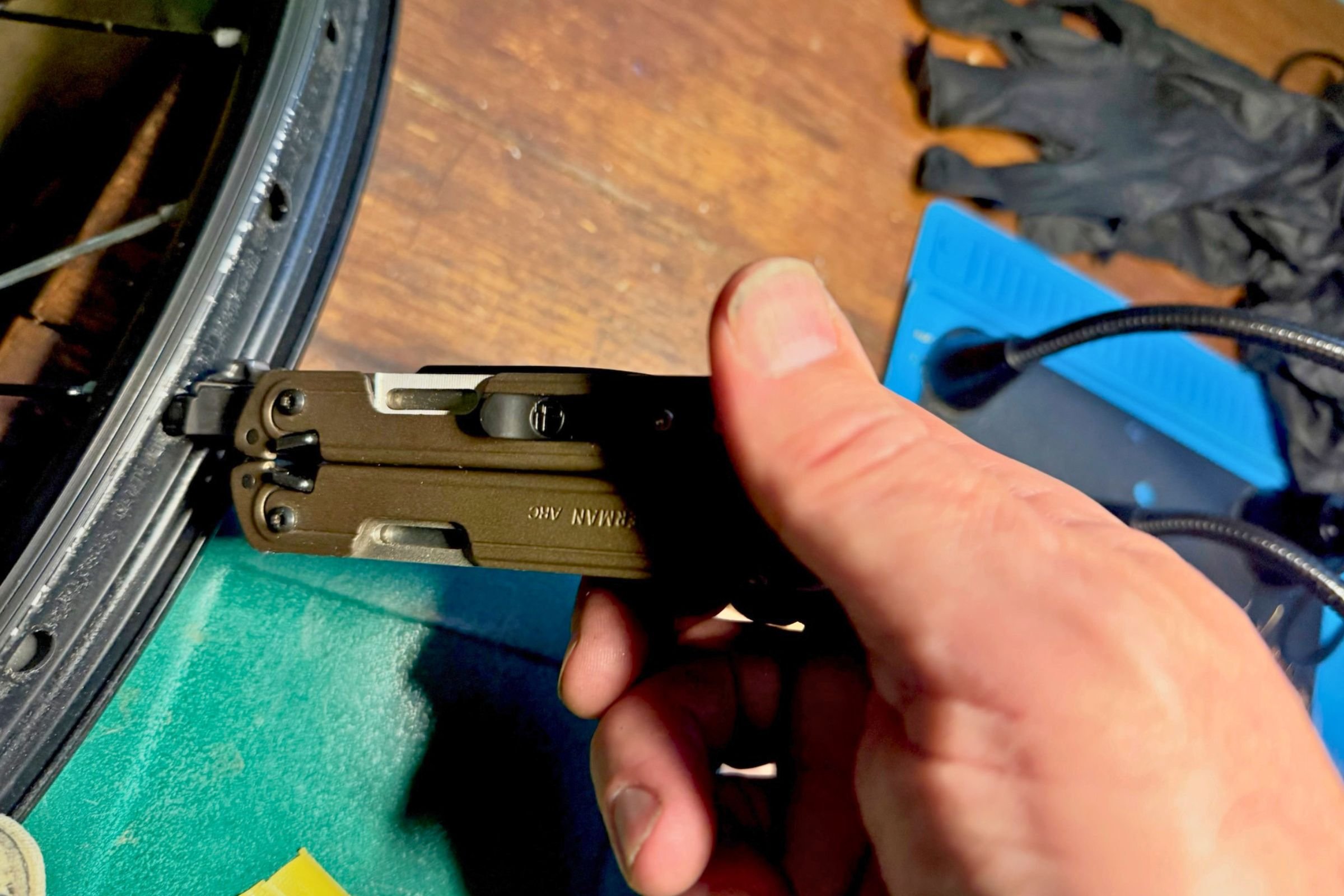 We used the Leatherman ARC’s bit driver to help start spoke nipples on spokes when building a new bike wheel.