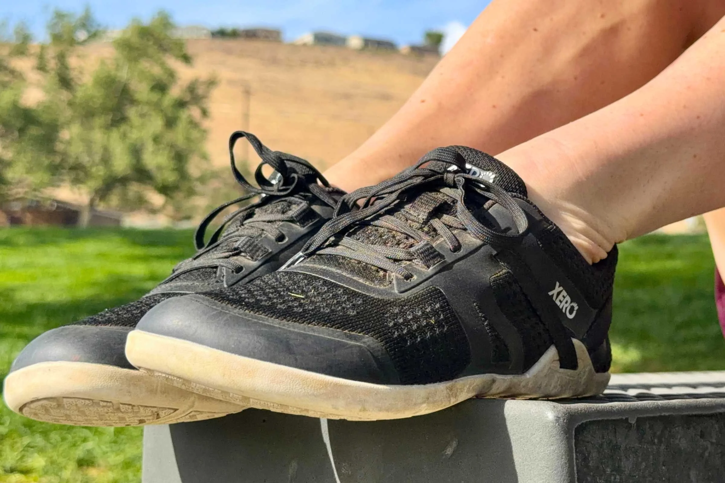 Enjoying a fine summer day in the Xero Prio Neo with feet up on a picnic bench. Photo courtesy Maggie Nichols