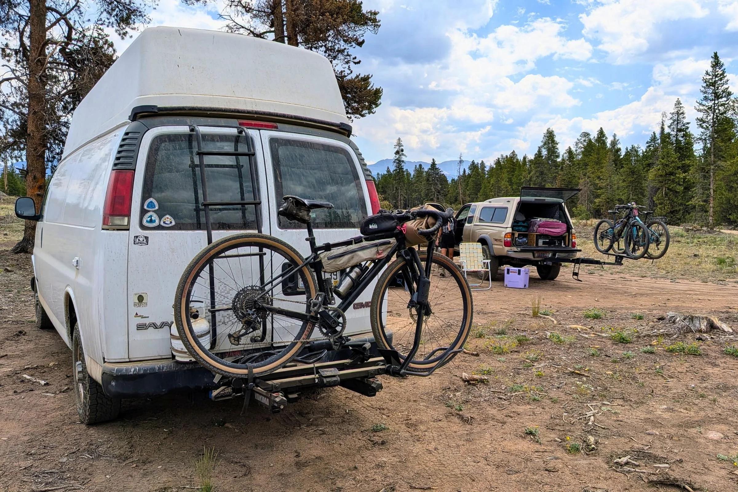 Side view of a van fitted with a Yakima EXO DoubleUp 2-Bike Hitch Rack.