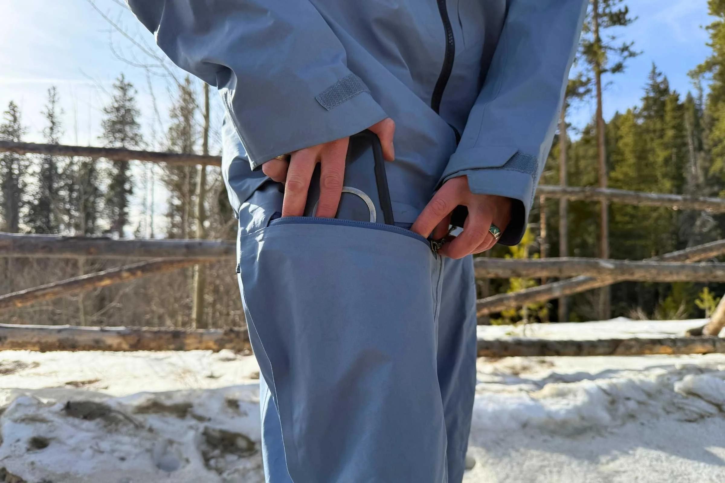 Both thigh pockets in the PowSlayer pants have electronics sleeves and beacon loops. Photo by Jon Stockwell.