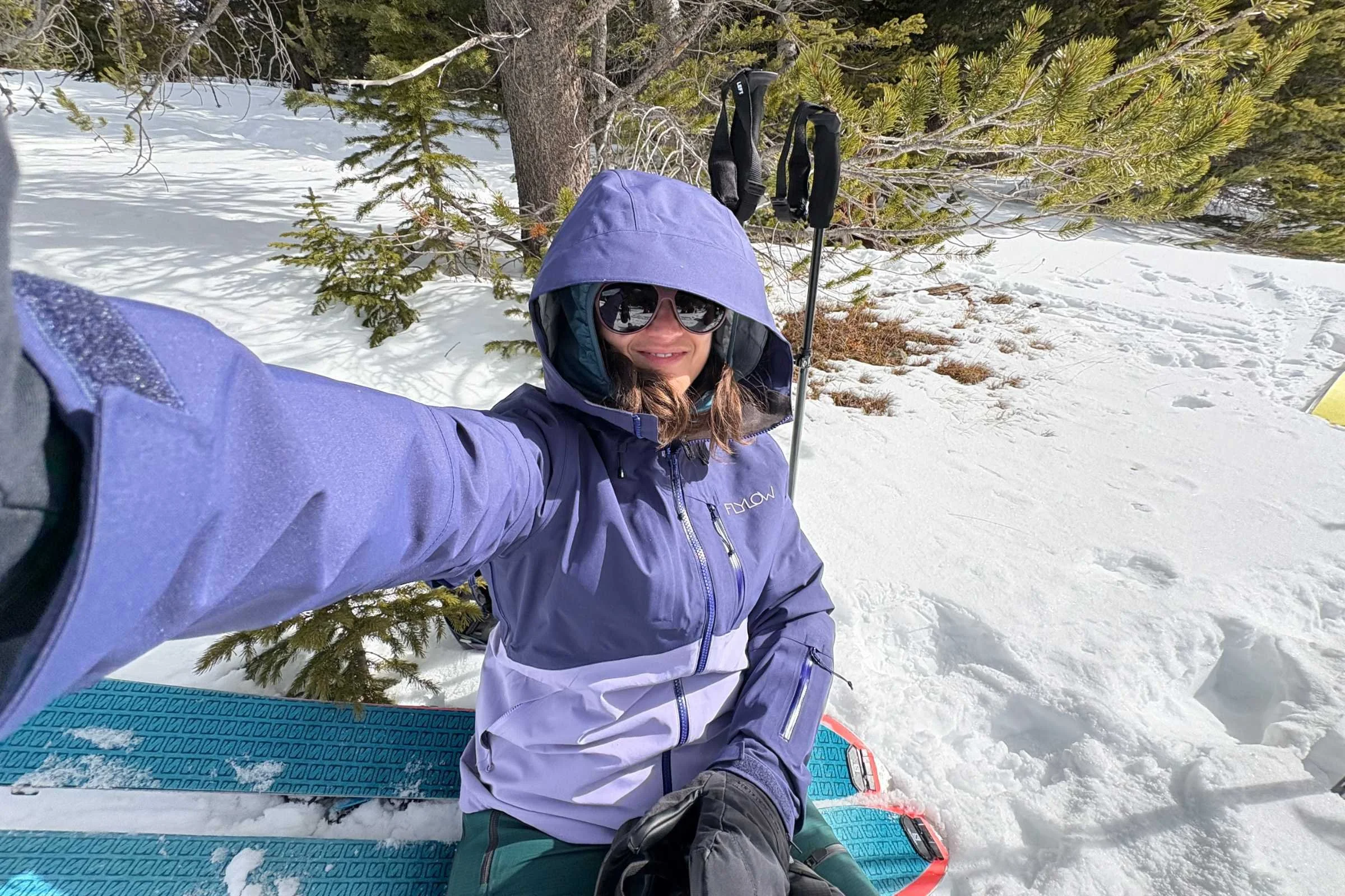 Snowboarder in the backcountry showing jacket durability and style in the Flylow Billie Coat