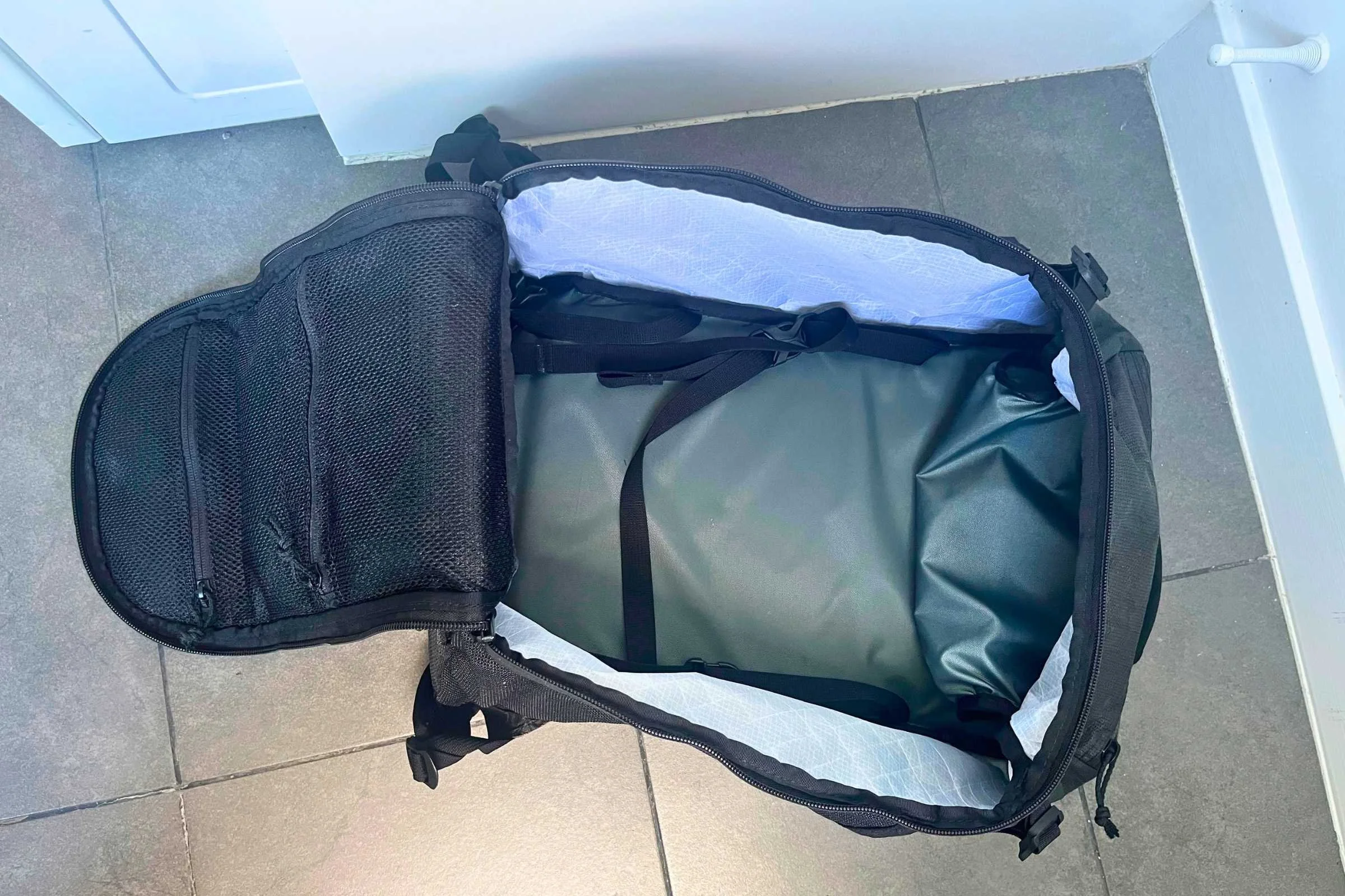 ULA Ultra Dragonfly 30L Adventure Travel Backpack showing clamshell access for easy packing.