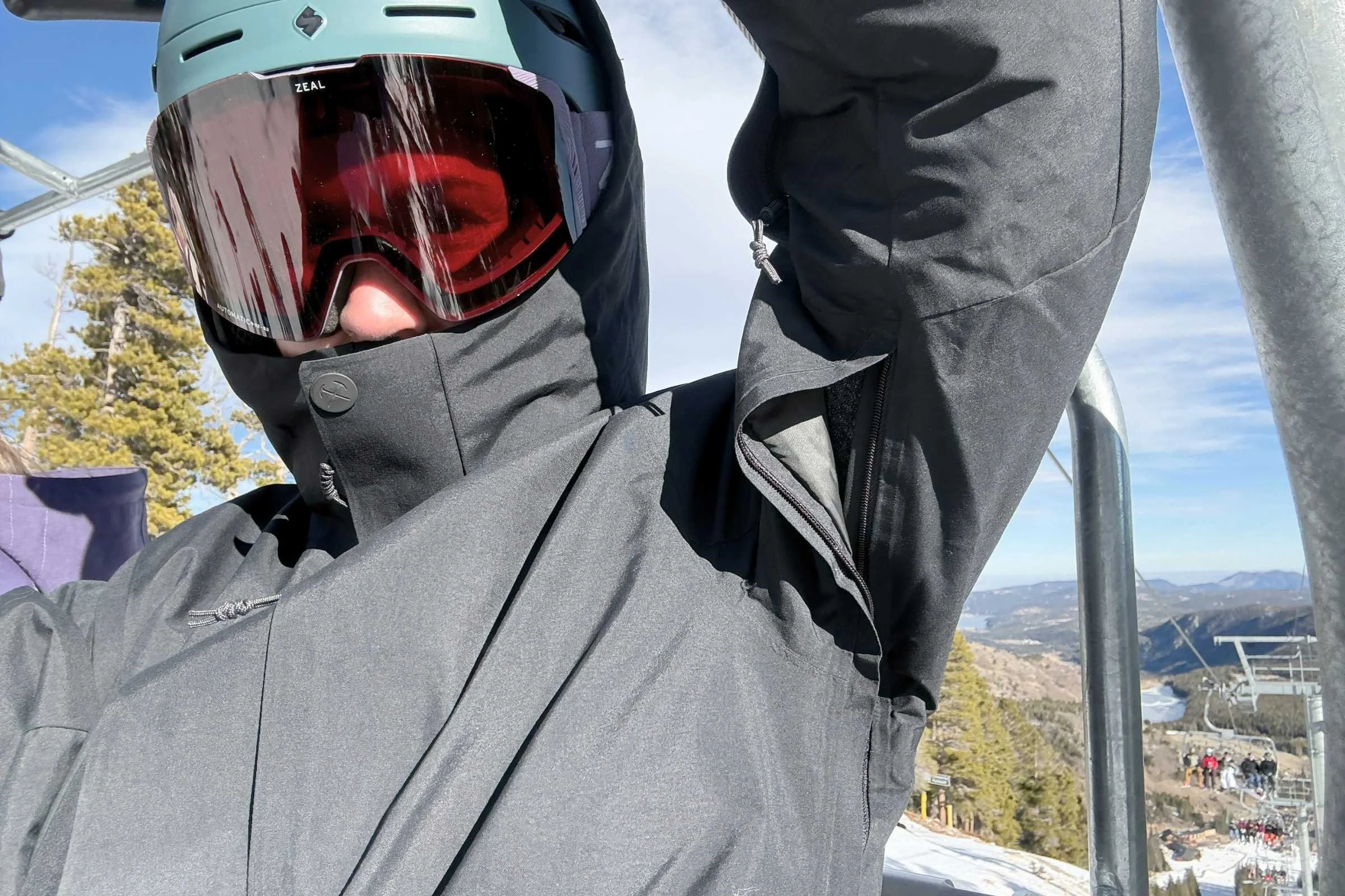 Pit zips open on REI Co-op Powderbound Insulated snowboard jacket for ventilation