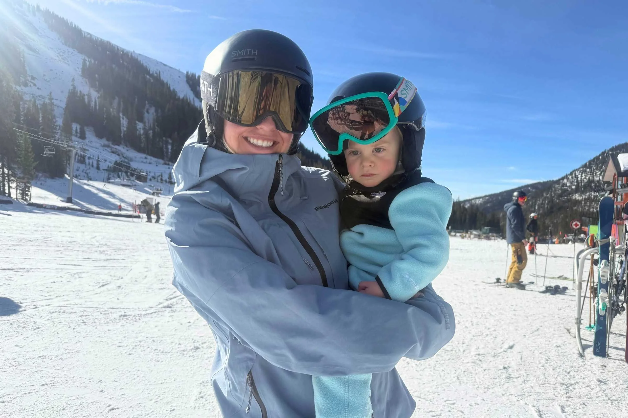 The author in the PowSlayer kit, teaching her son to ski at Arapahoe Basin in Colorado. Photo by Jon Stockwell.