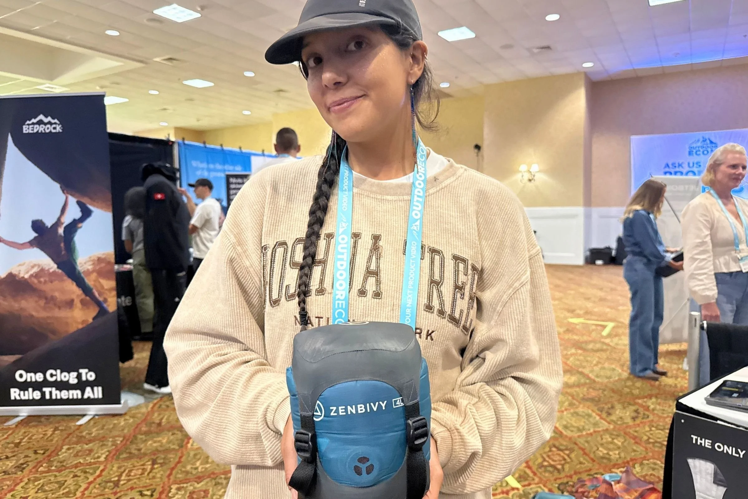 A woman at a convention during the 2026 Outdoor Media Summit.
