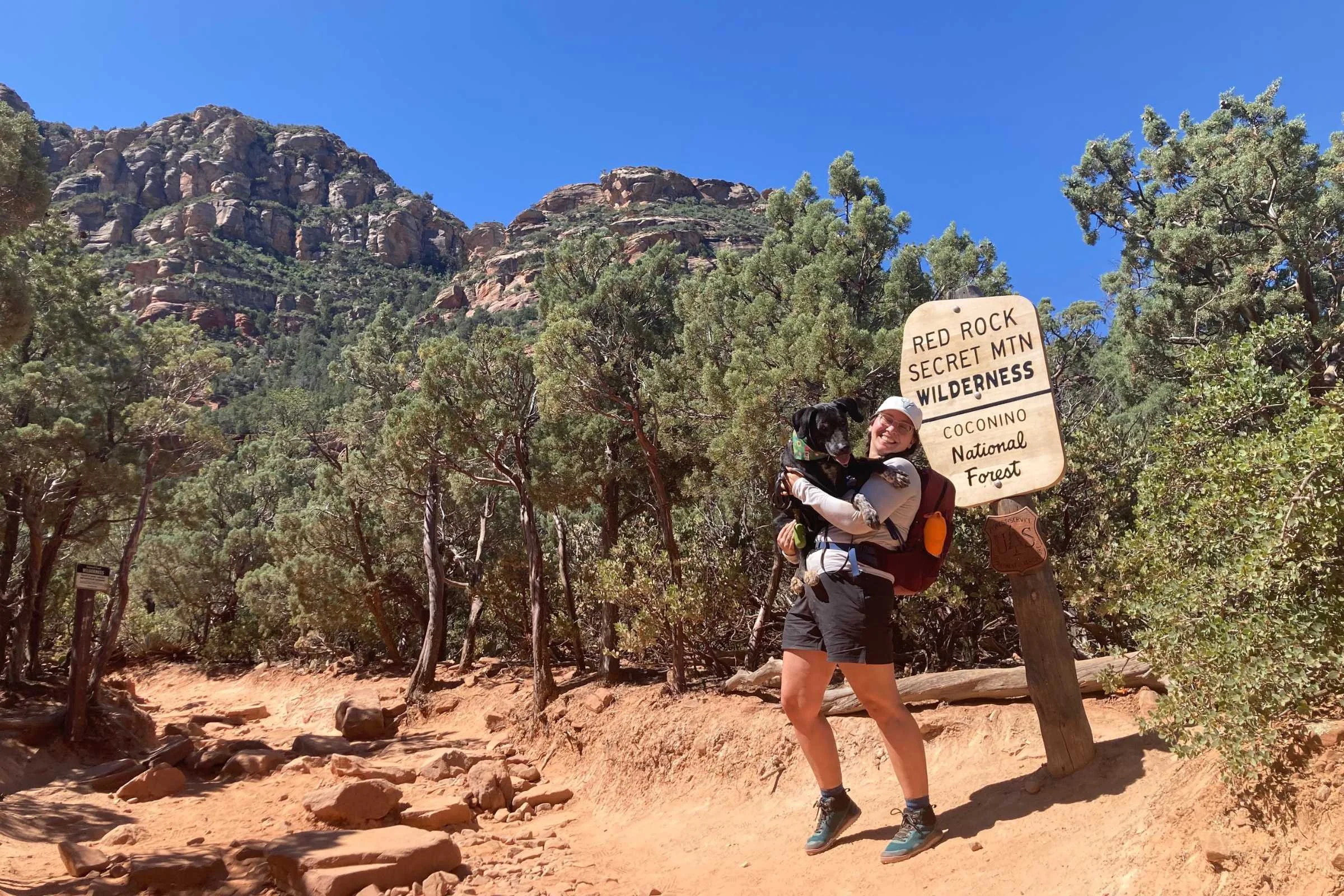 Hiker wearing comfortable hiking shorts on desert trail in Sedona Arizona