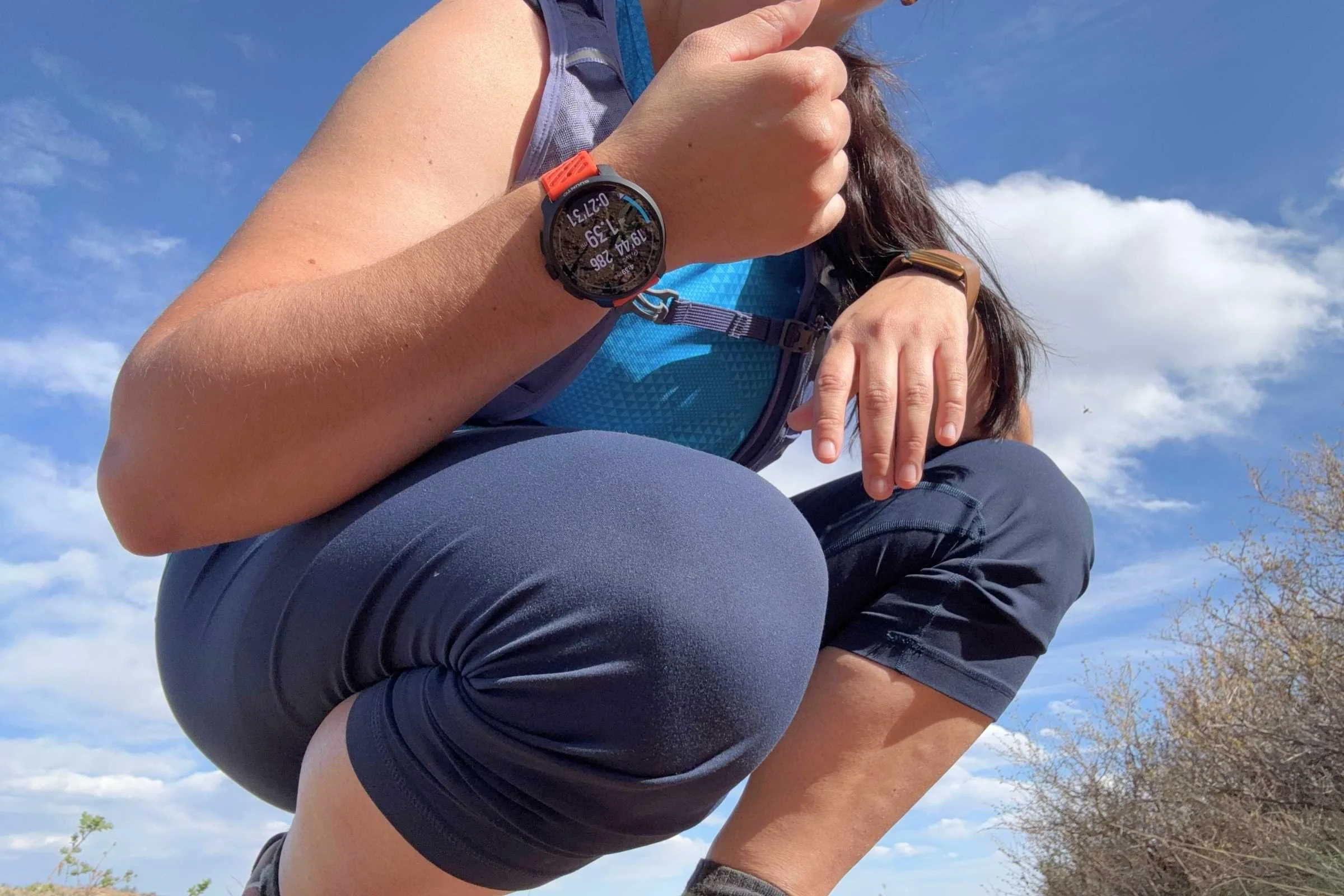 A runner showing off the face of the Suunto Race 2