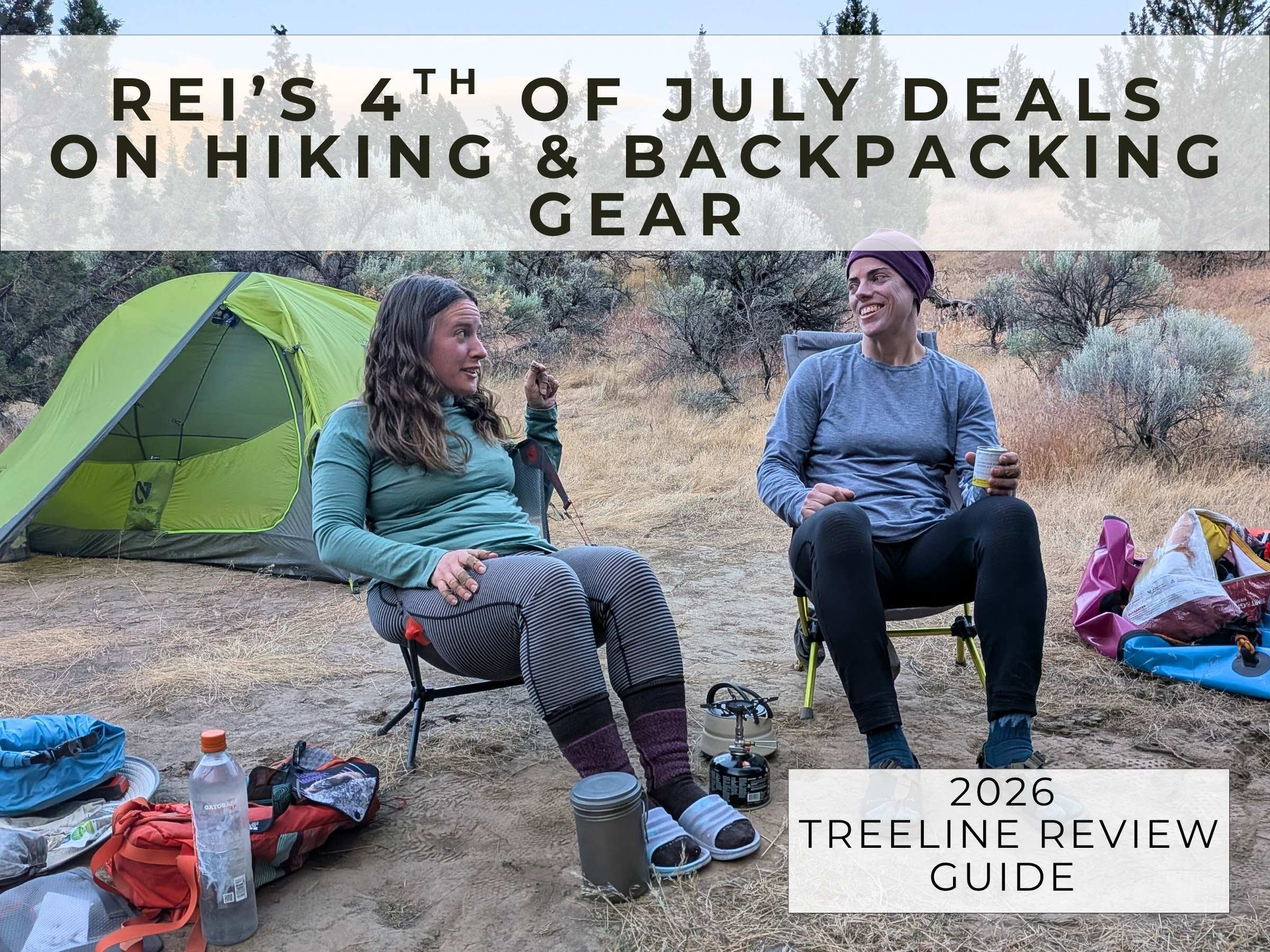 Two backpackers sitting in their backpacking campsite with a tent in the background