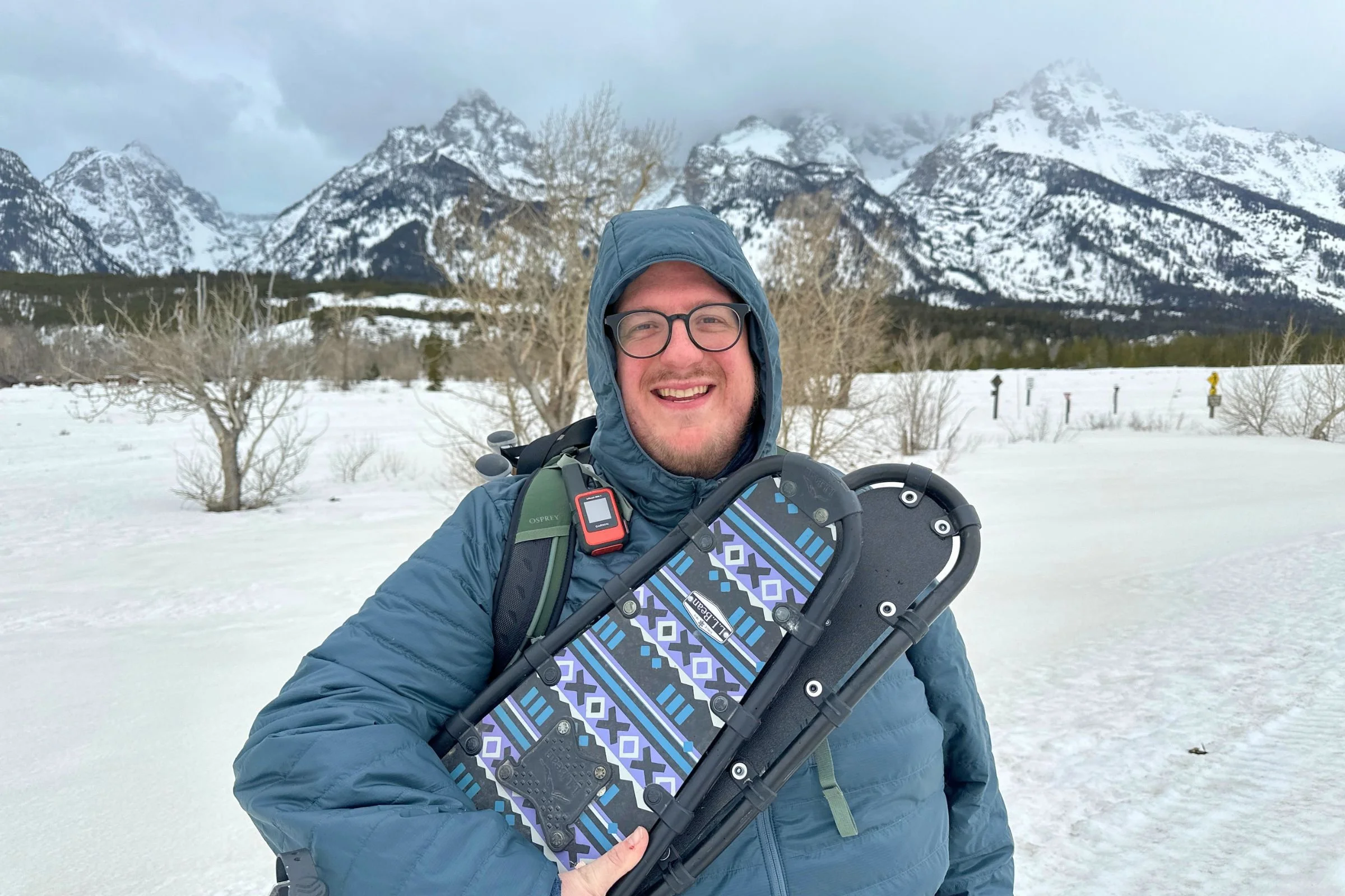 Snowshoeing in teh REI Microtrek Insulated Hoodie
