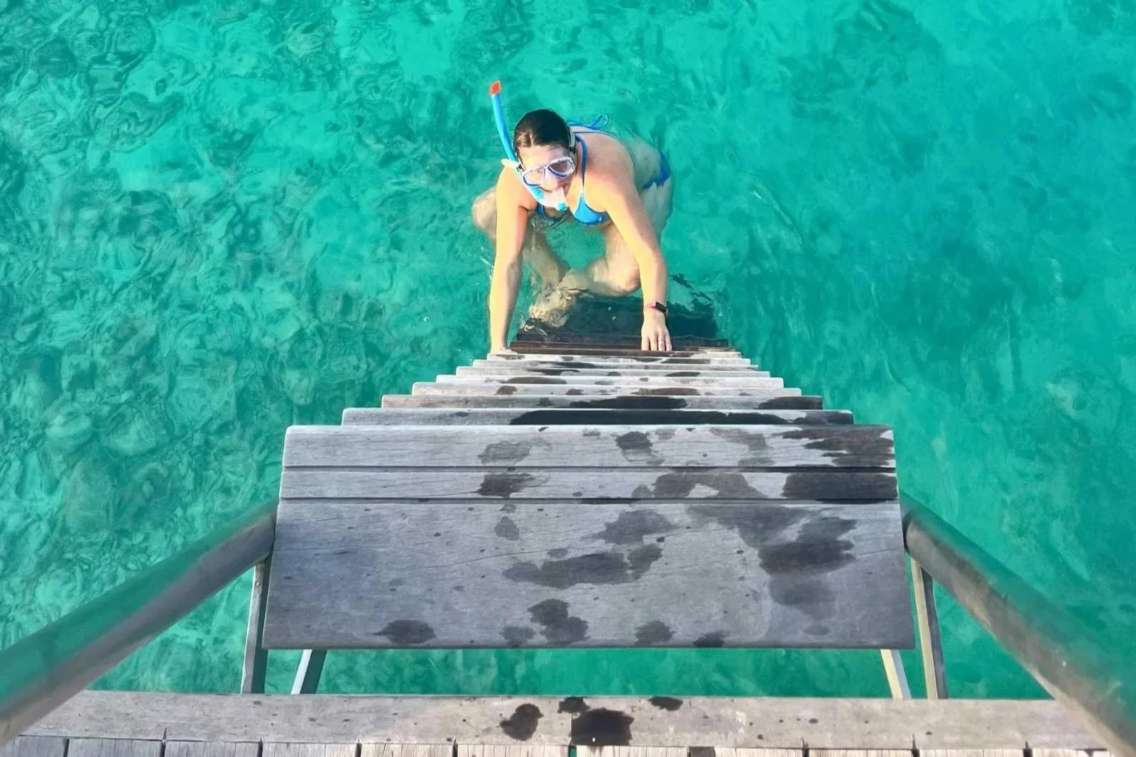The author snorkeling in the Maldives, where she tested these reef-safe sunscreens.