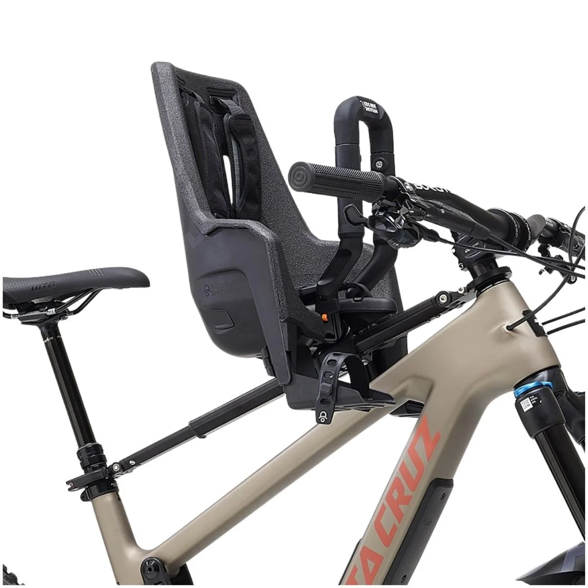 Kids Ride Shotgun Shotgun Pro EVO 2-in-1 Child Bike Seat on a tan colored bike.