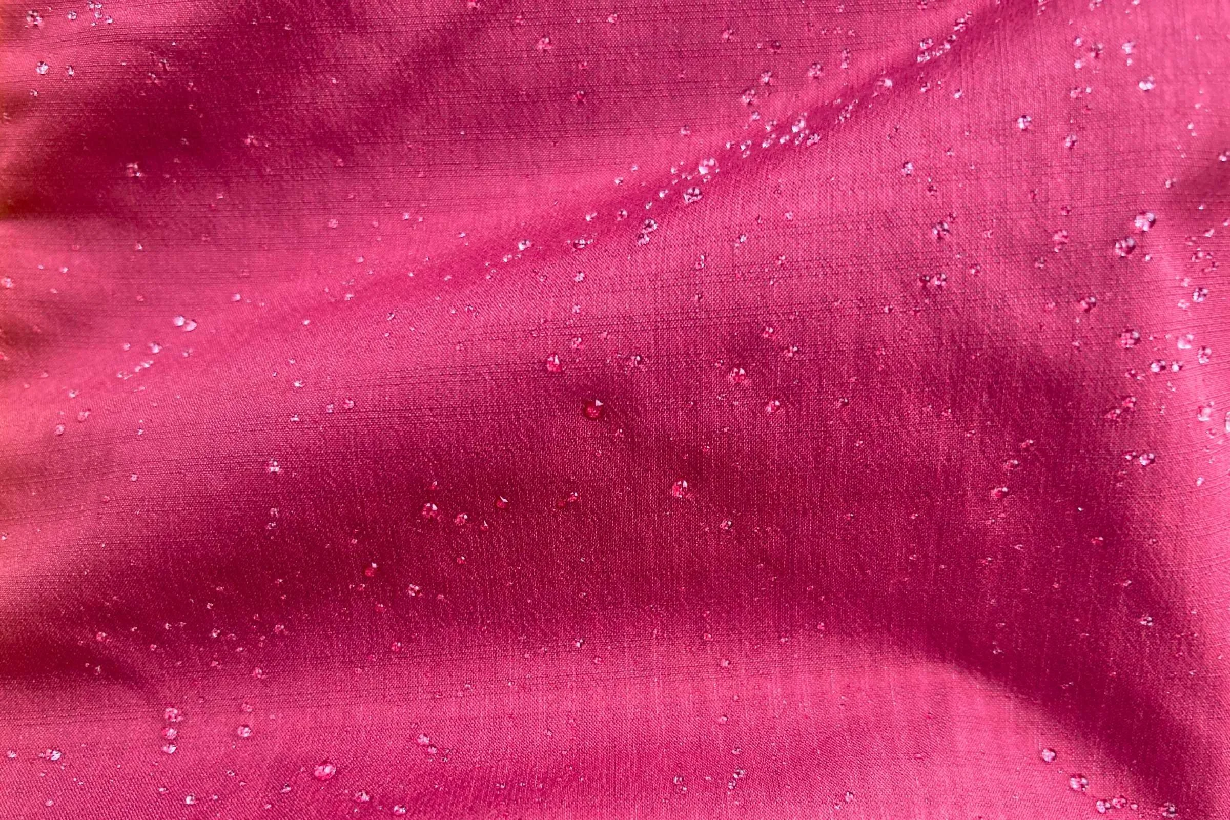 Durable Water Repellent (DWR) in action on the Janji Rainrunner. Photo by Trey French