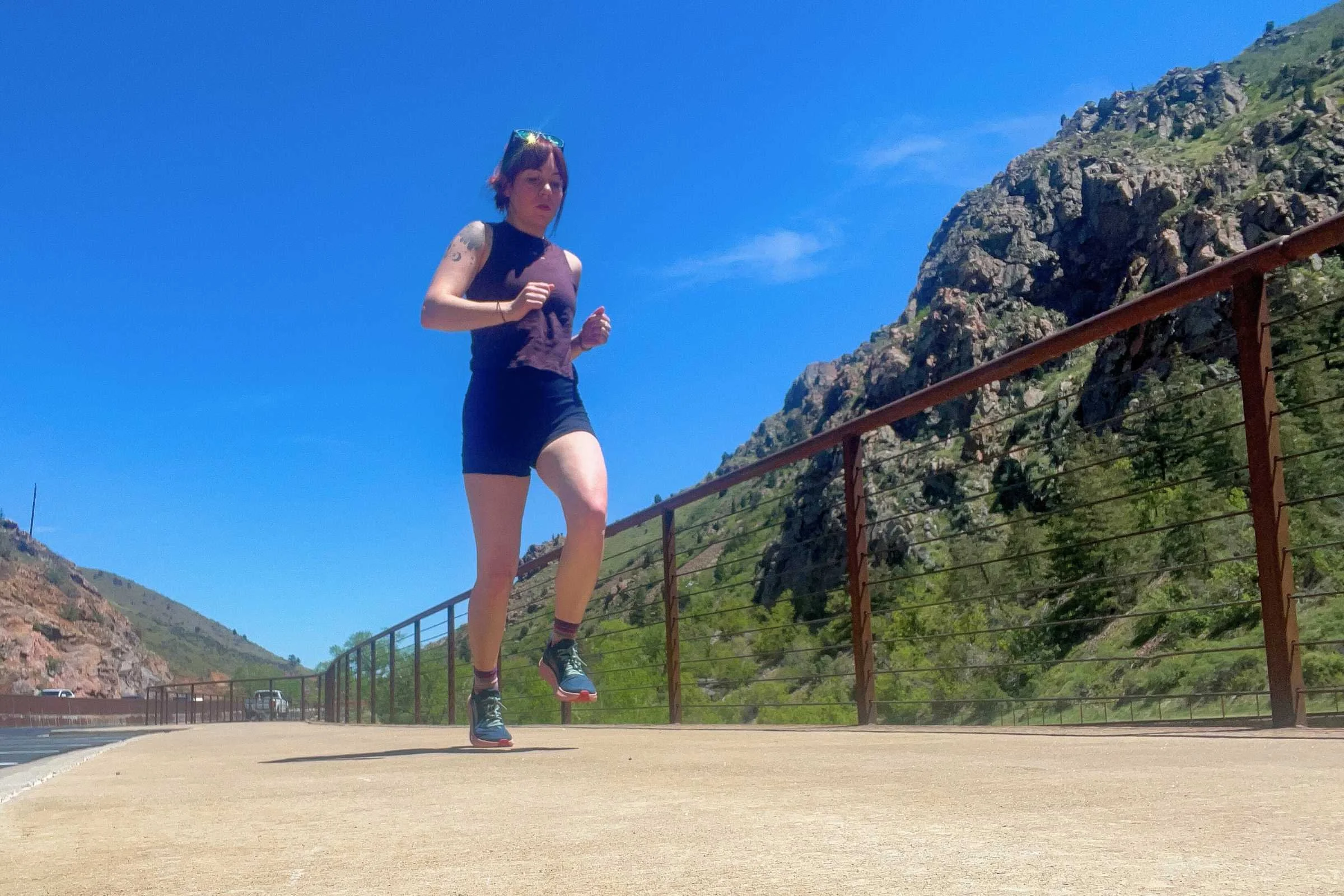 The primary difference between running shoes and sneakers is that running shoes are tailored specifically for the activity of running. They are technical, more durable, and cost more than sneakers. (Runner is wearing the Altra Torin Zero Drop)