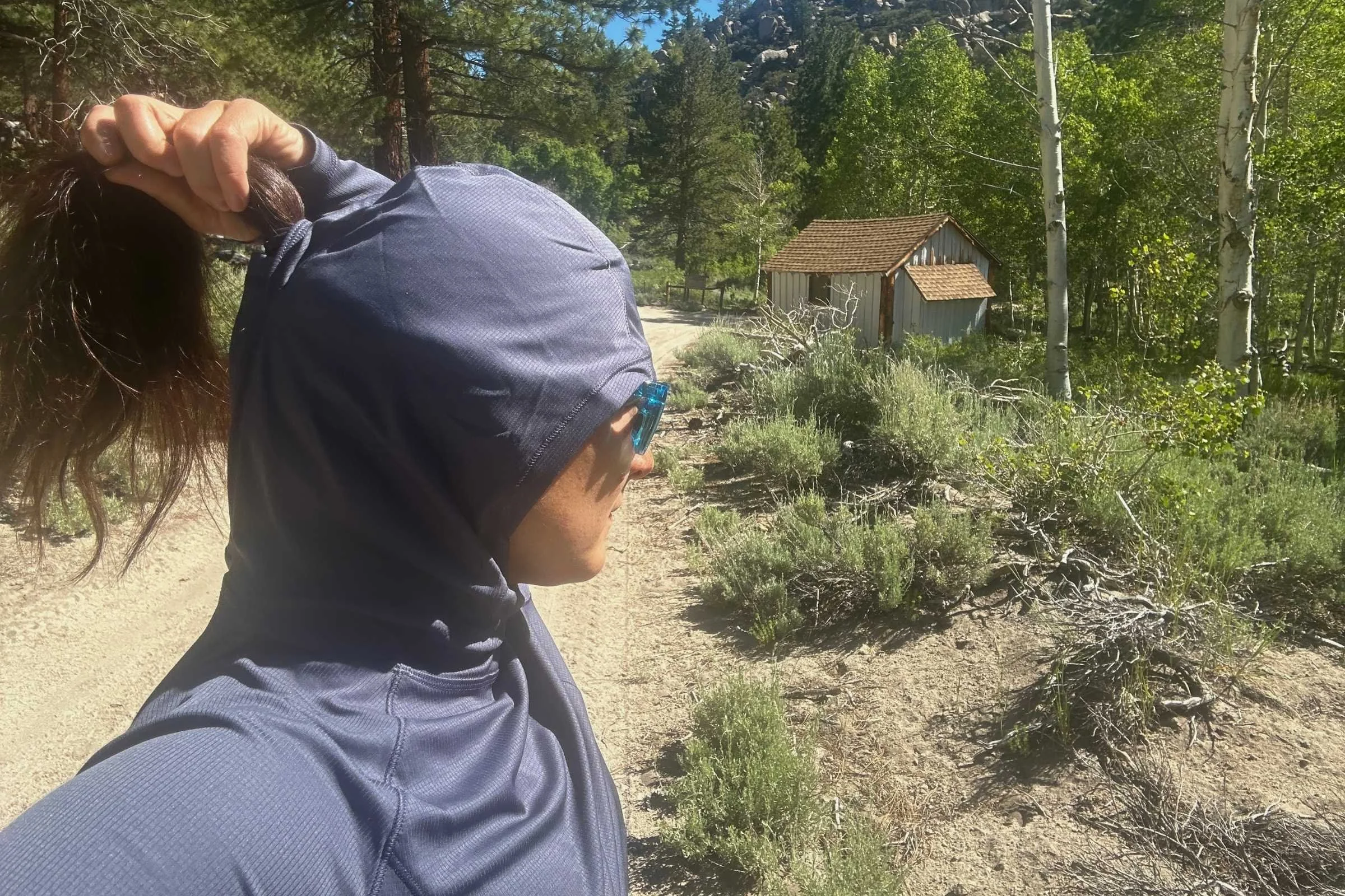 I was so happy to discover the pony tail hole on the REI Flash Shade hoodie.
