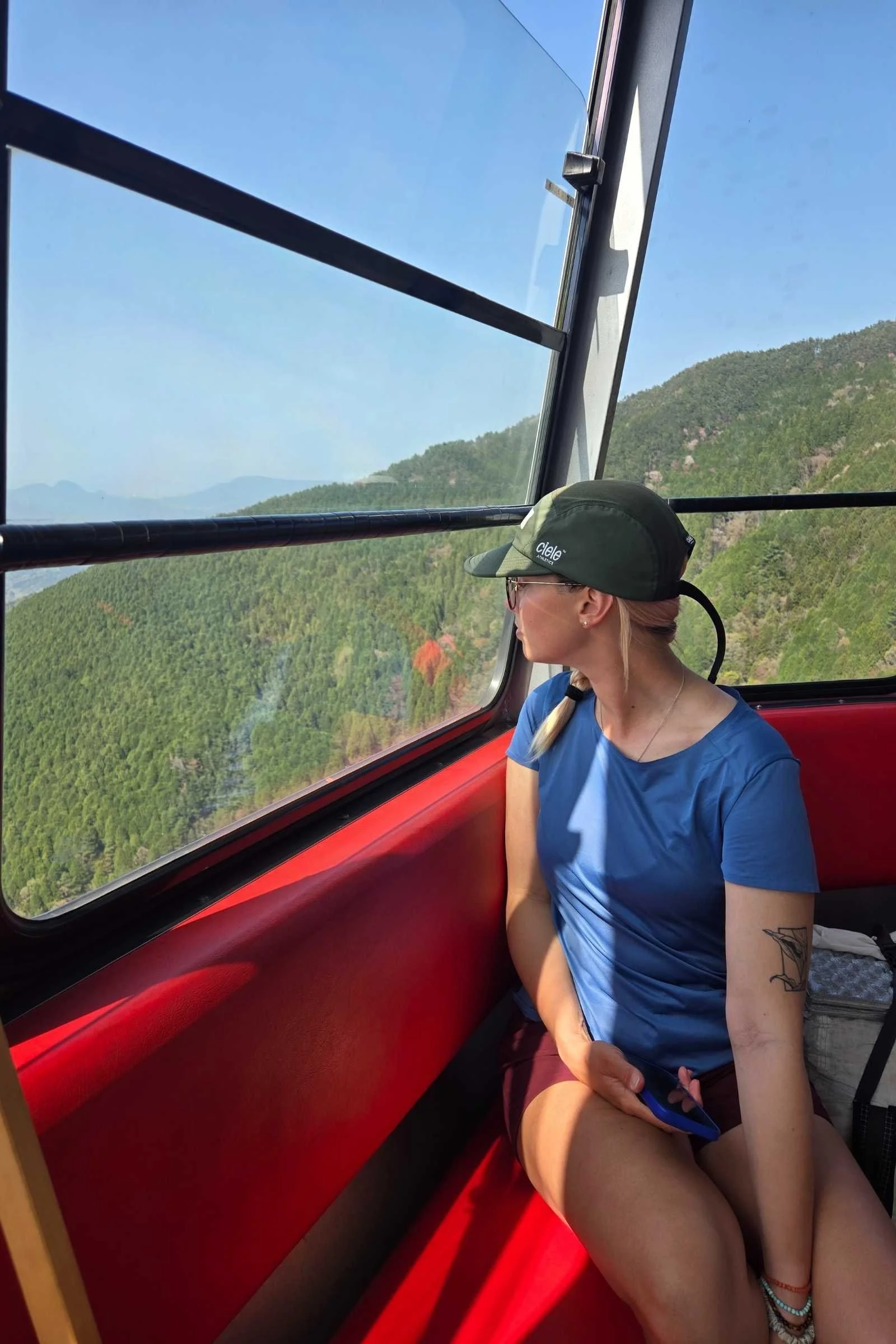 A woman riding a gondola in Japan