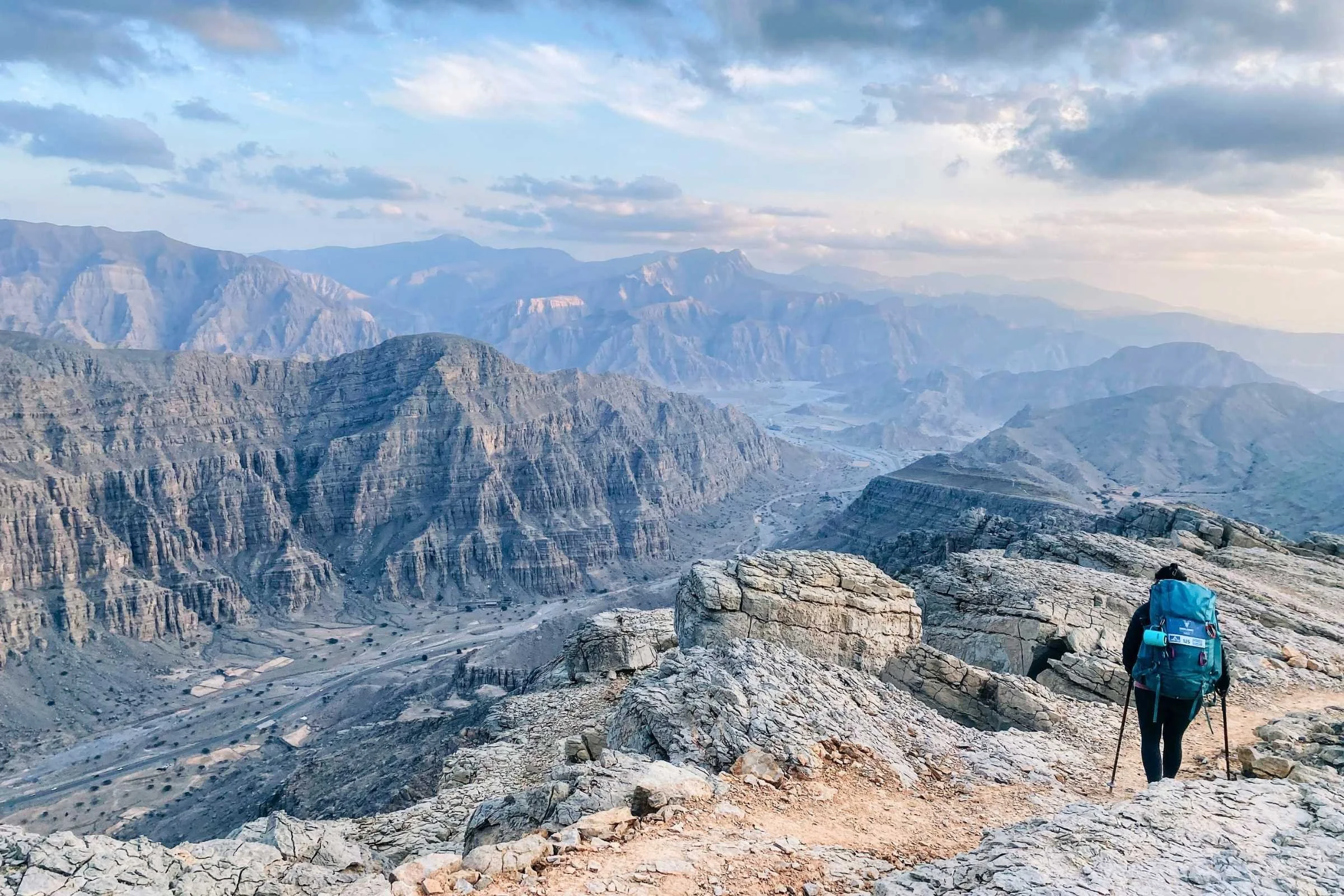 the author hiking in an alpine mountain range