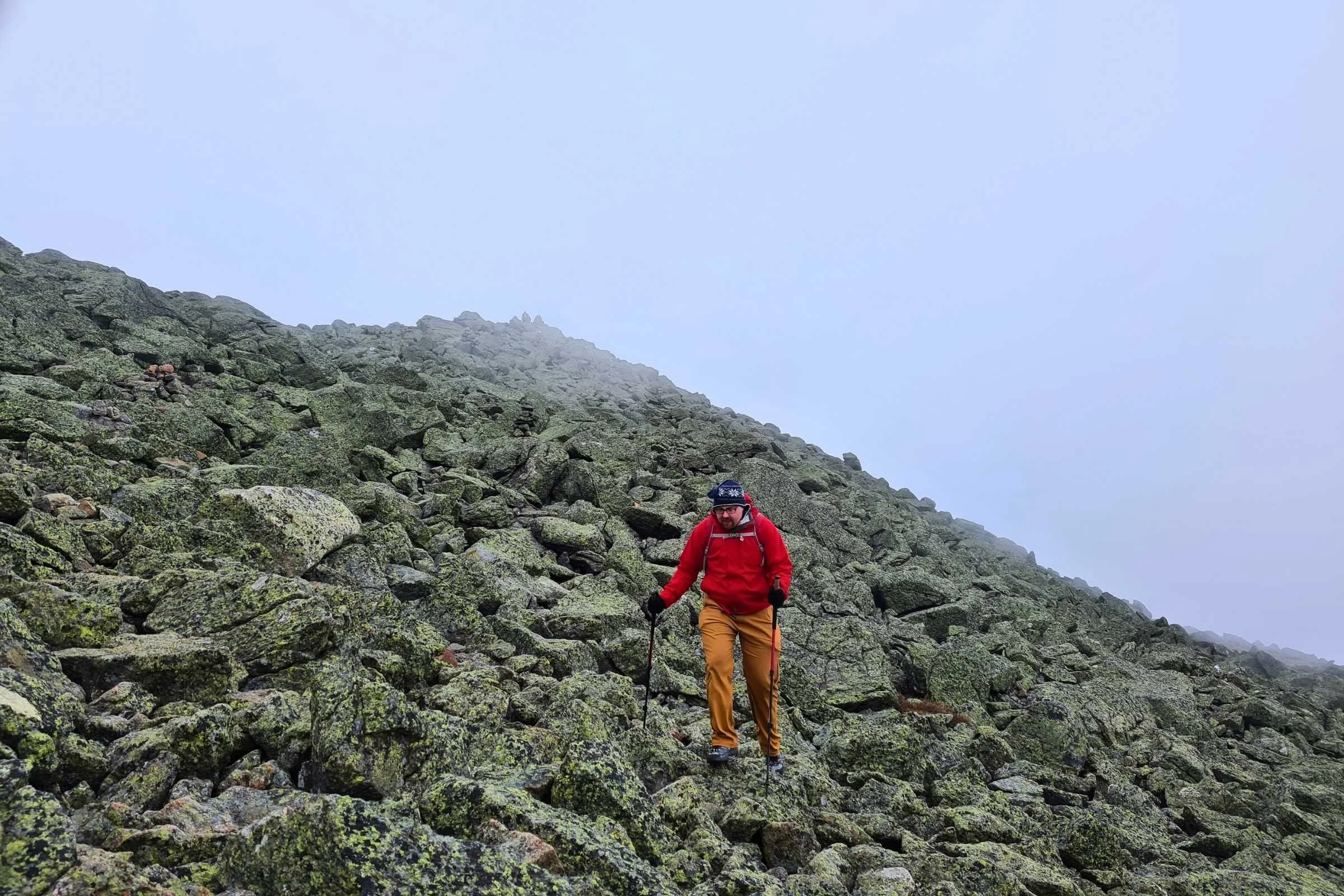 A hiker climbing towards the summit of Mt Adams. This is the formal, official trail. Photo by Aubri Drake.
