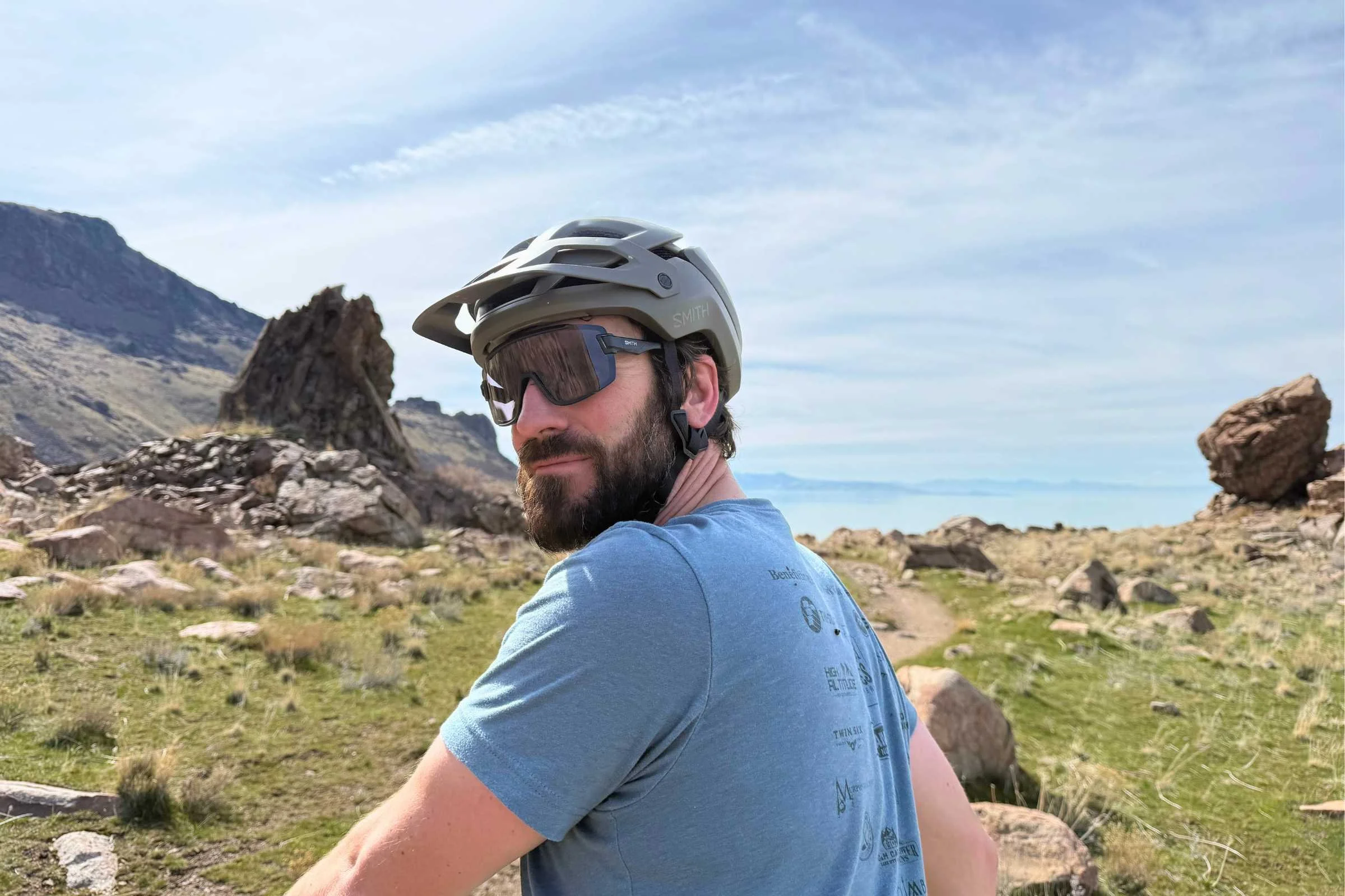 Tester wearing the Smith Optics Forefront 3 helmet on trail on a sunny day.