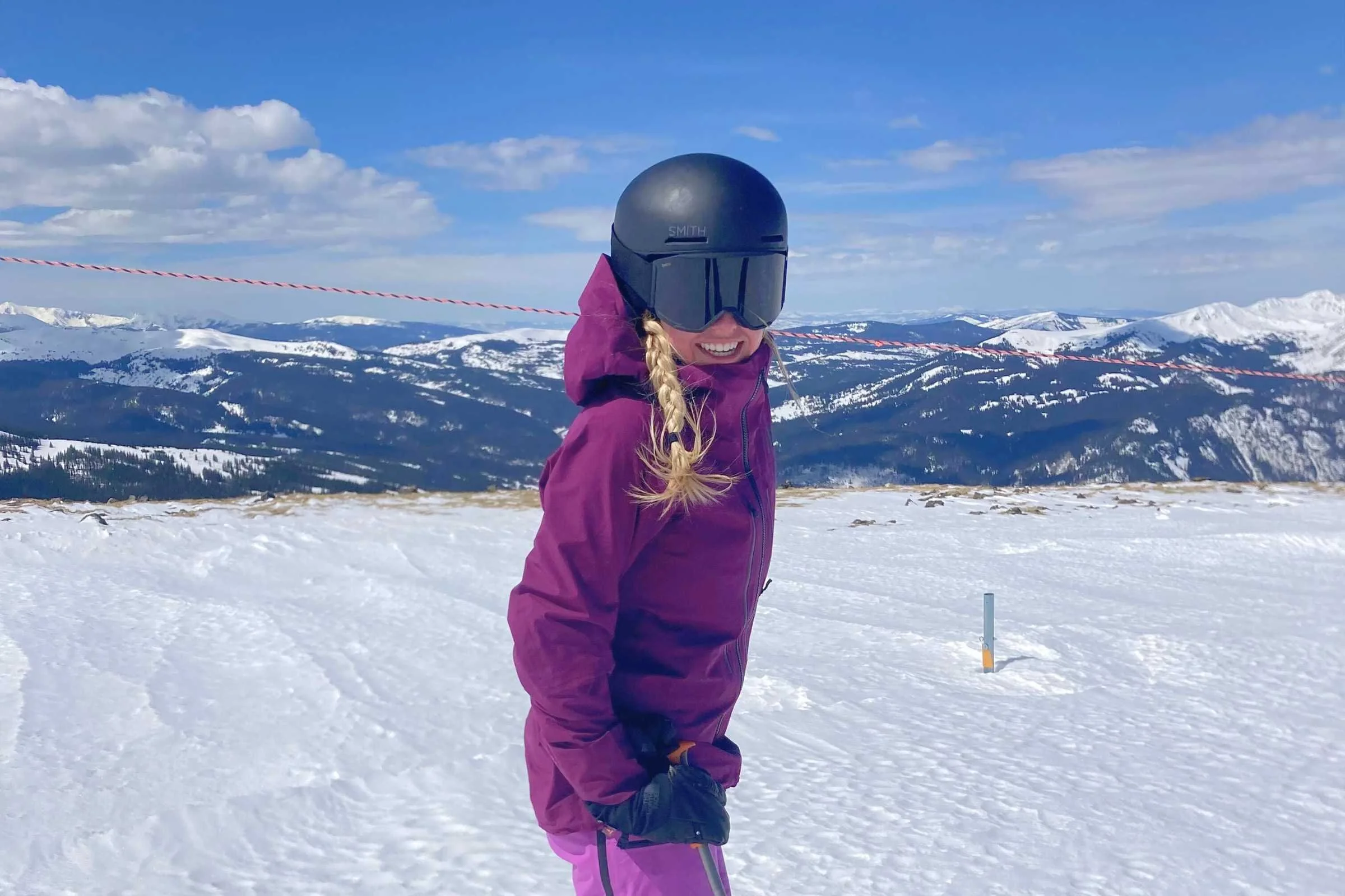 The author skiing in the Squad MAG goggles on a sunny and windy day in Breckenridge’s high alpine terrain.