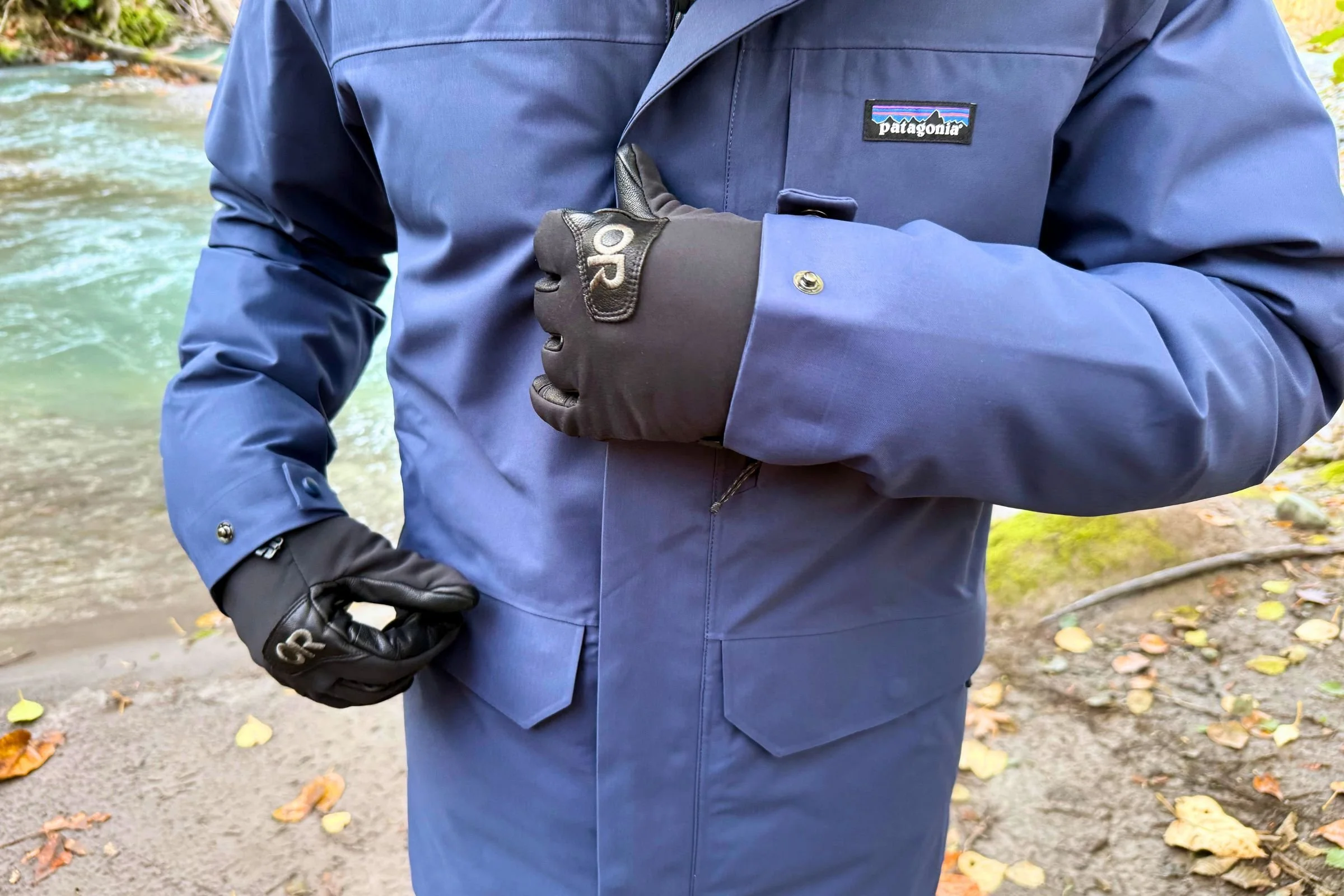 A front storm flap with snaps covers the two-way zipper to help shield out wind and cold.