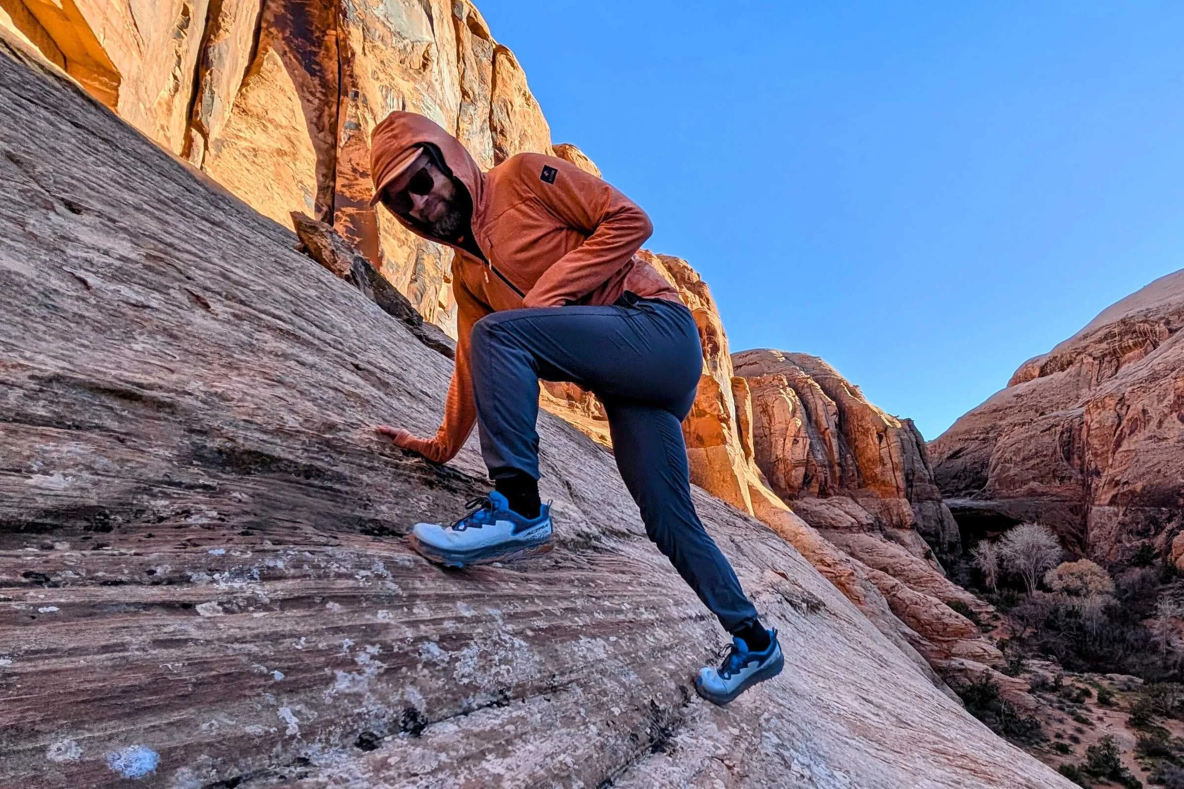 runner wearing the altra timp 6 trail running shoes in a canyon